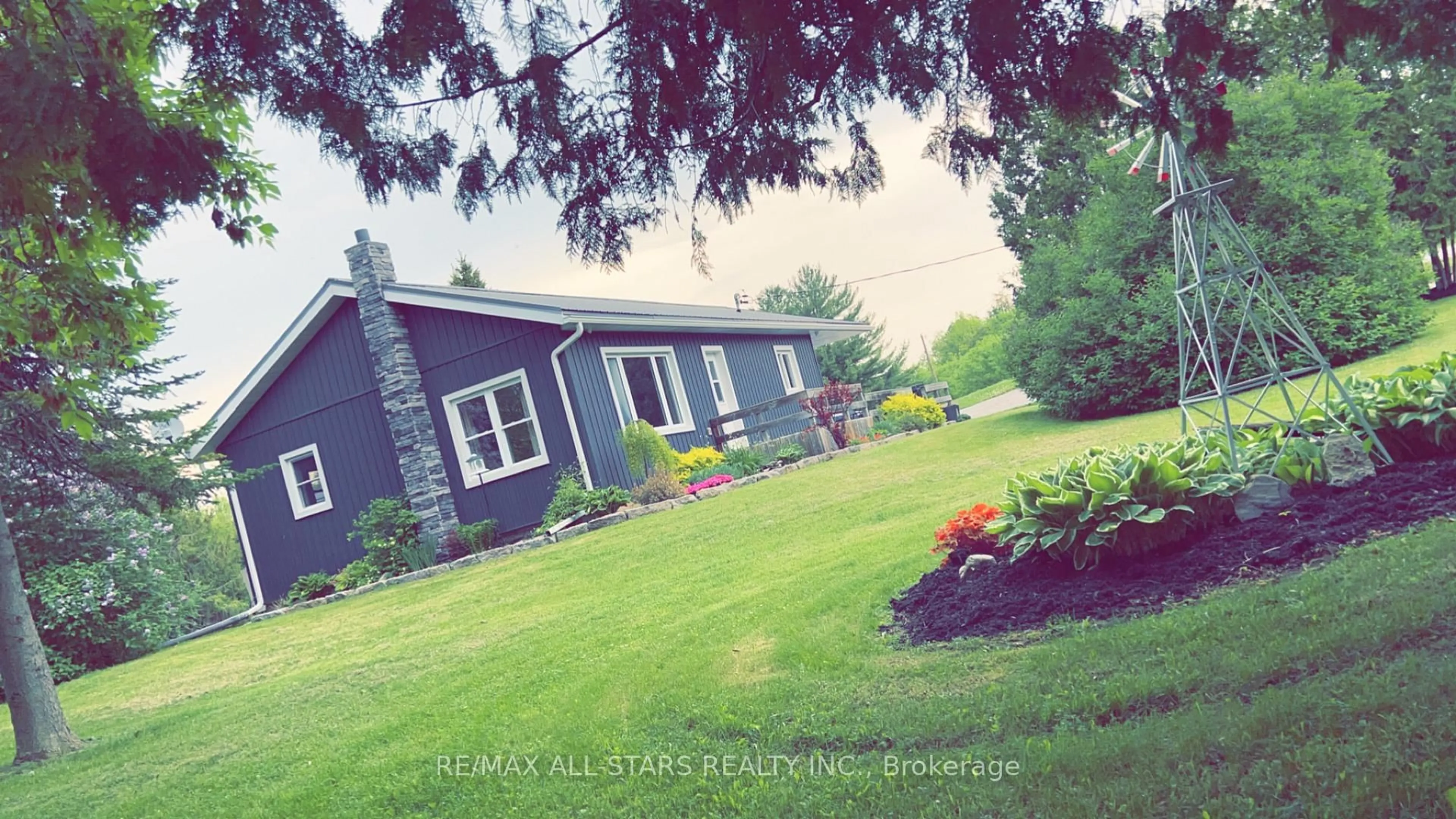 A pic from outside/outdoor area/front of a property/back of a property/a pic from drone, street for 255 County Rd 30, Kawartha Lakes Ontario K0M 1N0