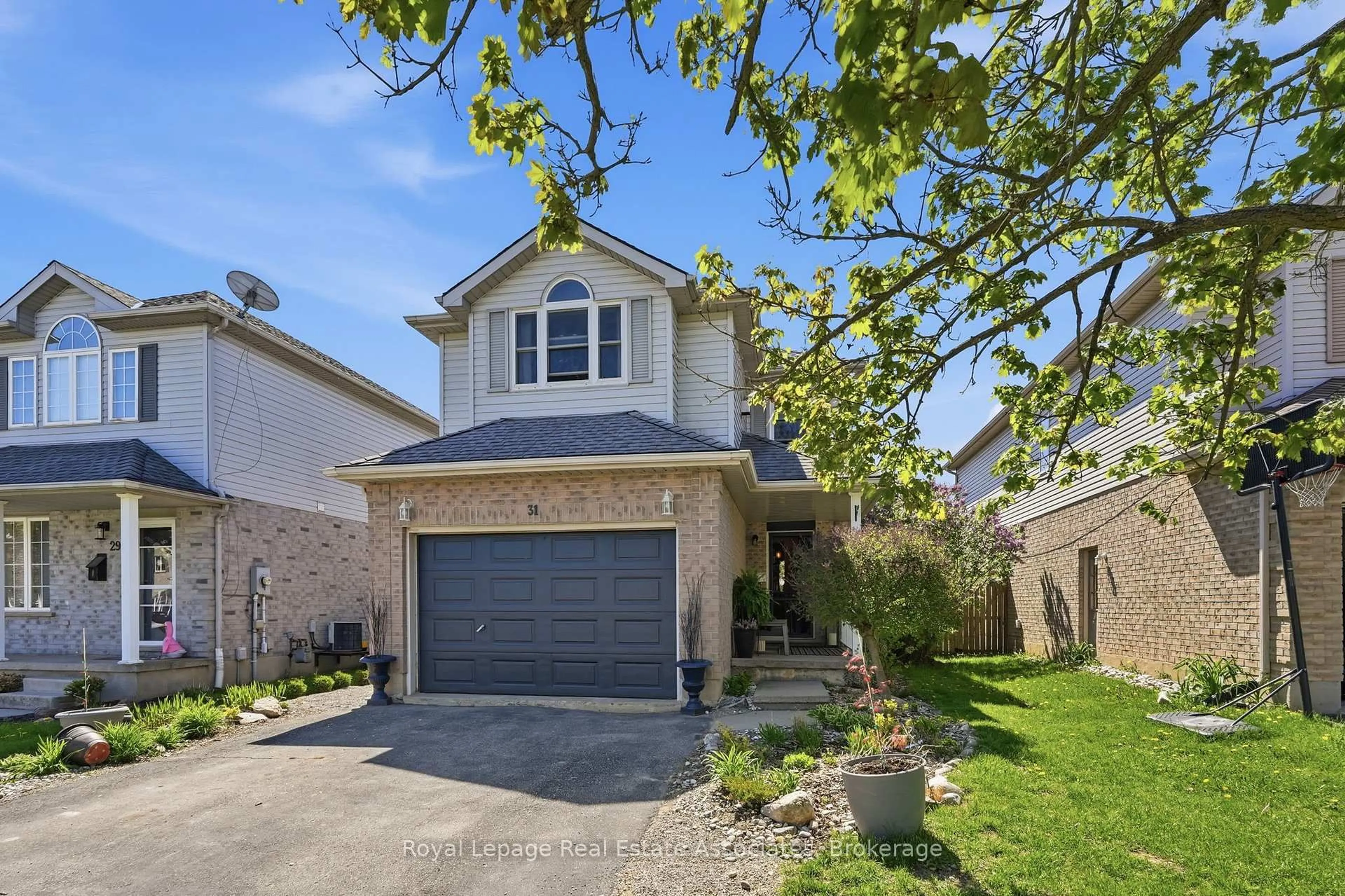 Home with brick exterior material, street for 31 Tulip Dr, Tillsonburg Ontario N4G 5S5