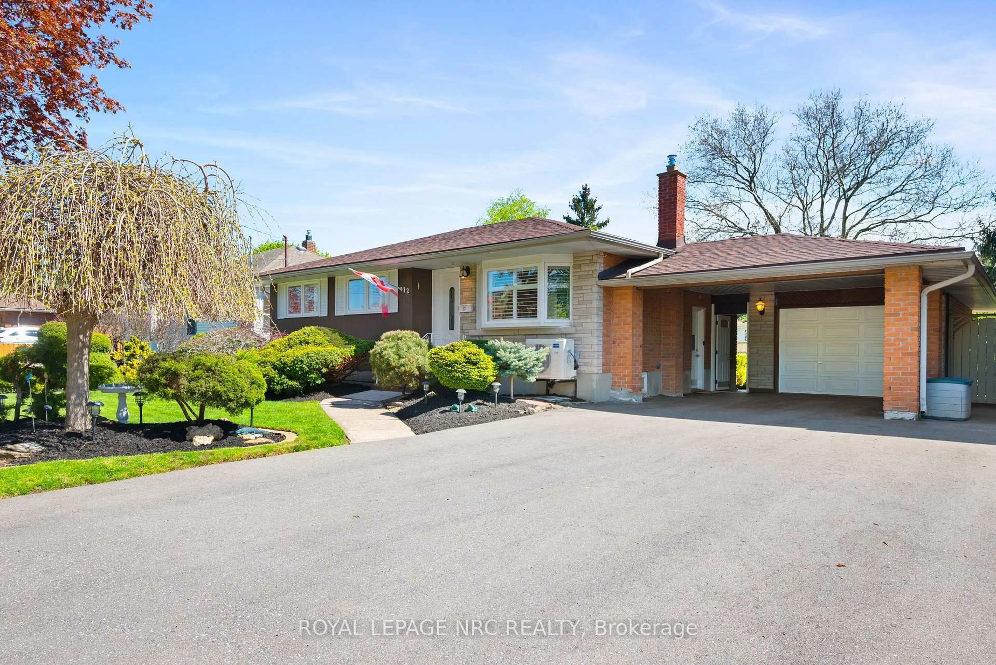 Home with brick exterior material, street for 12 Glenview Ave, St. Catharines Ontario L2N 2Z6