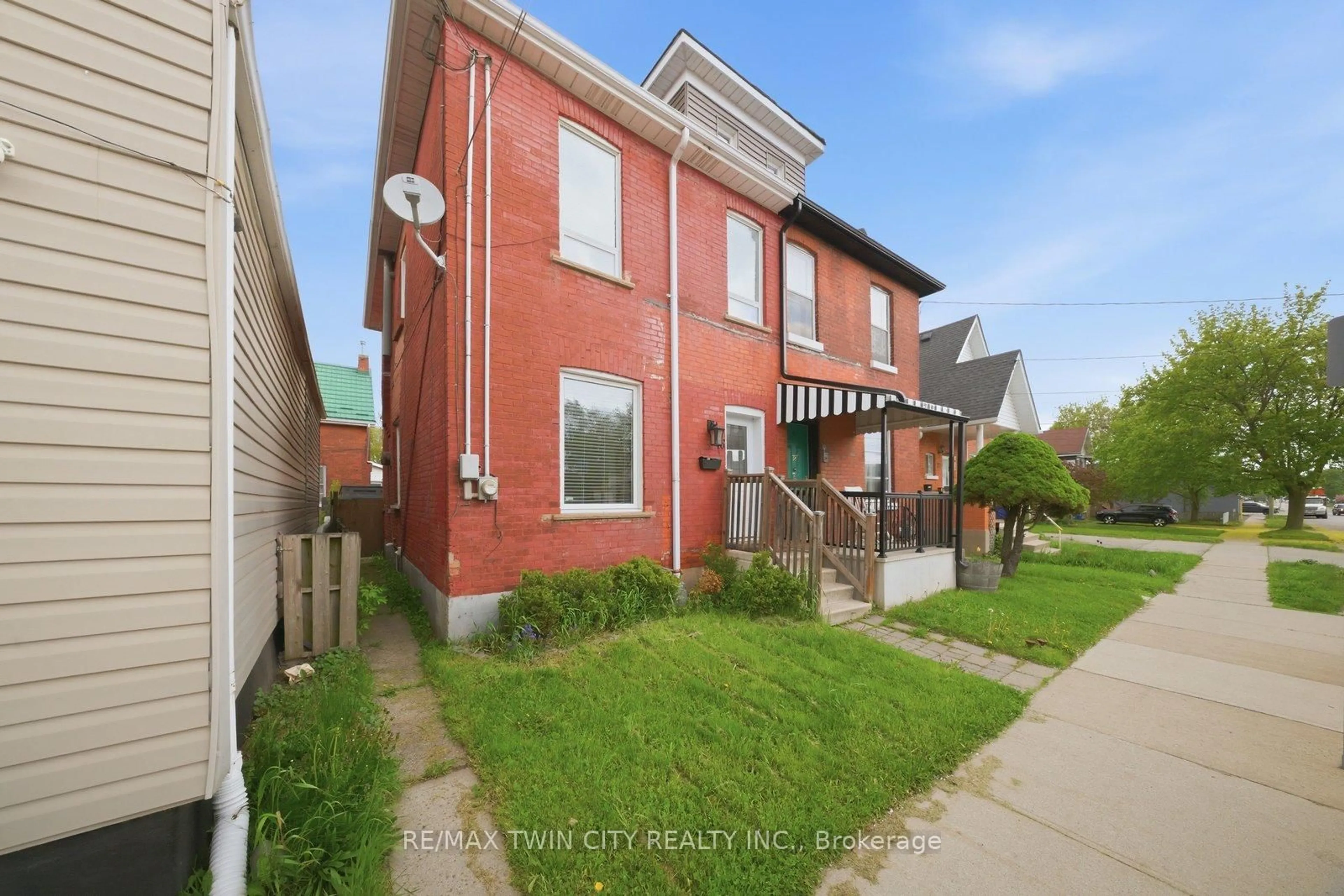 Home with brick exterior material, street for 76 Grey St, Brantford Ontario N3T 2T5