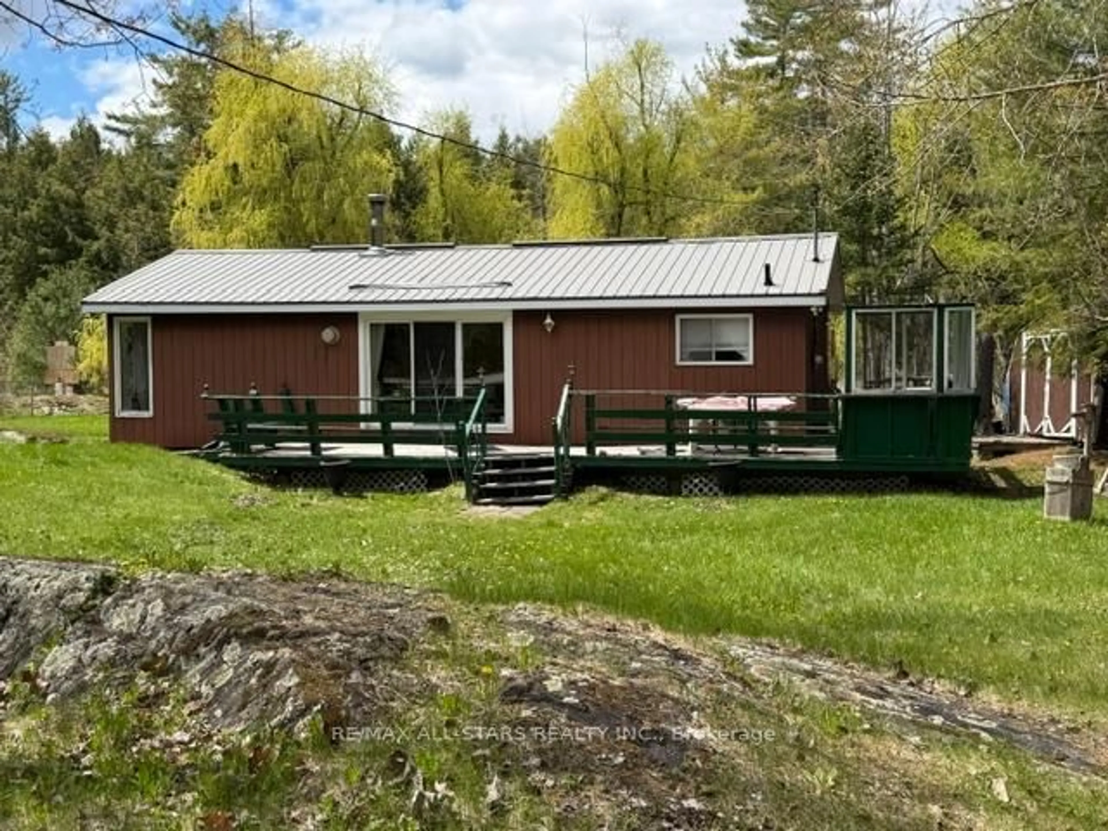 A pic from outside/outdoor area/front of a property/back of a property/a pic from drone, unknown for 480 Kennedy Dr, Trent Lakes Ontario K0M 1A0
