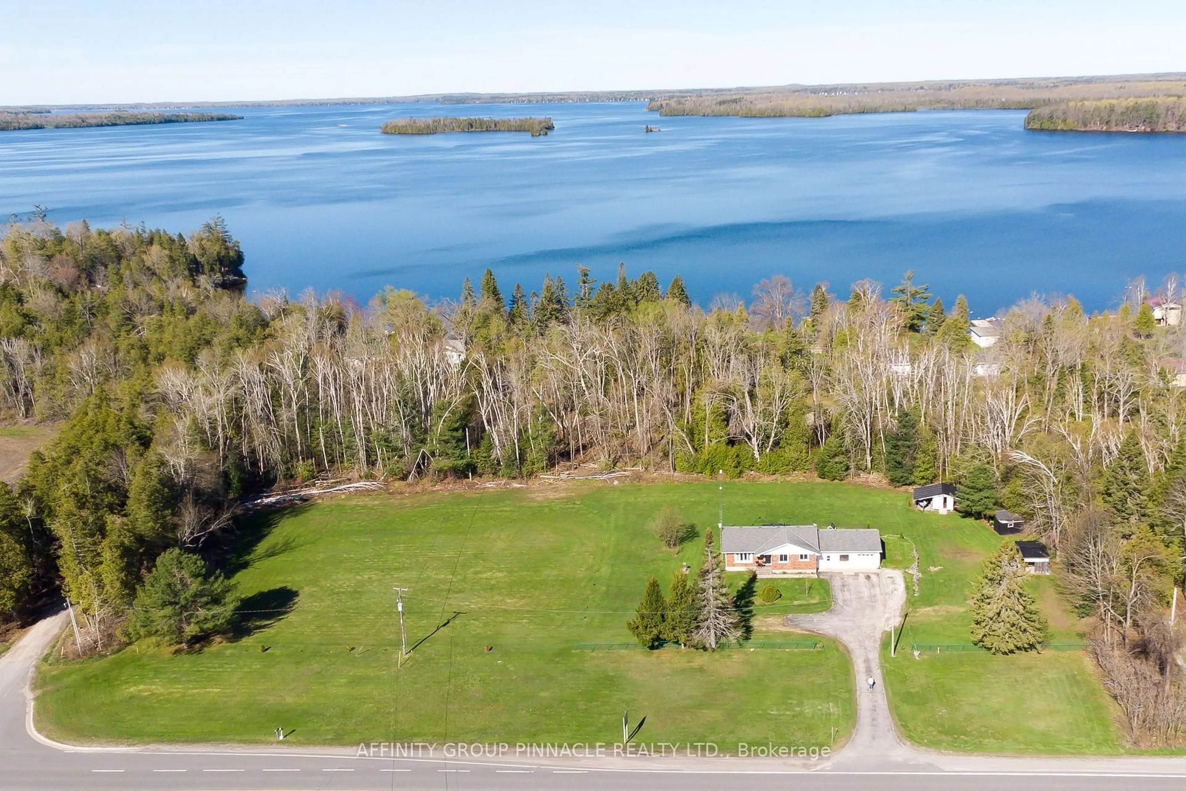 A pic from outside/outdoor area/front of a property/back of a property/a pic from drone, water/lake/river/ocean view for 6077 35 Highway, Kawartha Lakes Ontario K0M 1N0
