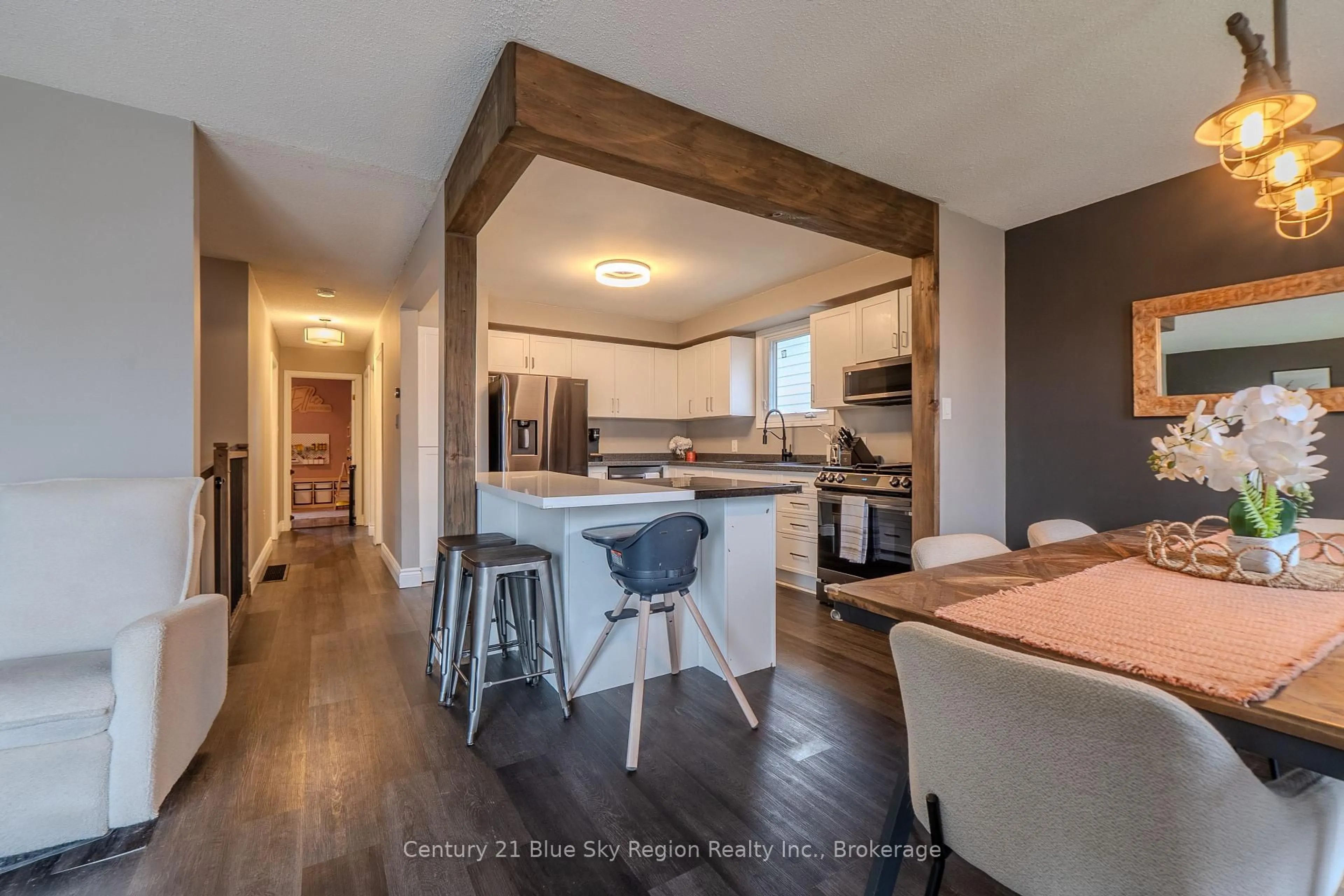 Open concept kitchen, wood/laminate floor for 34 Belleview Cres, North Bay Ontario P1B 8V4