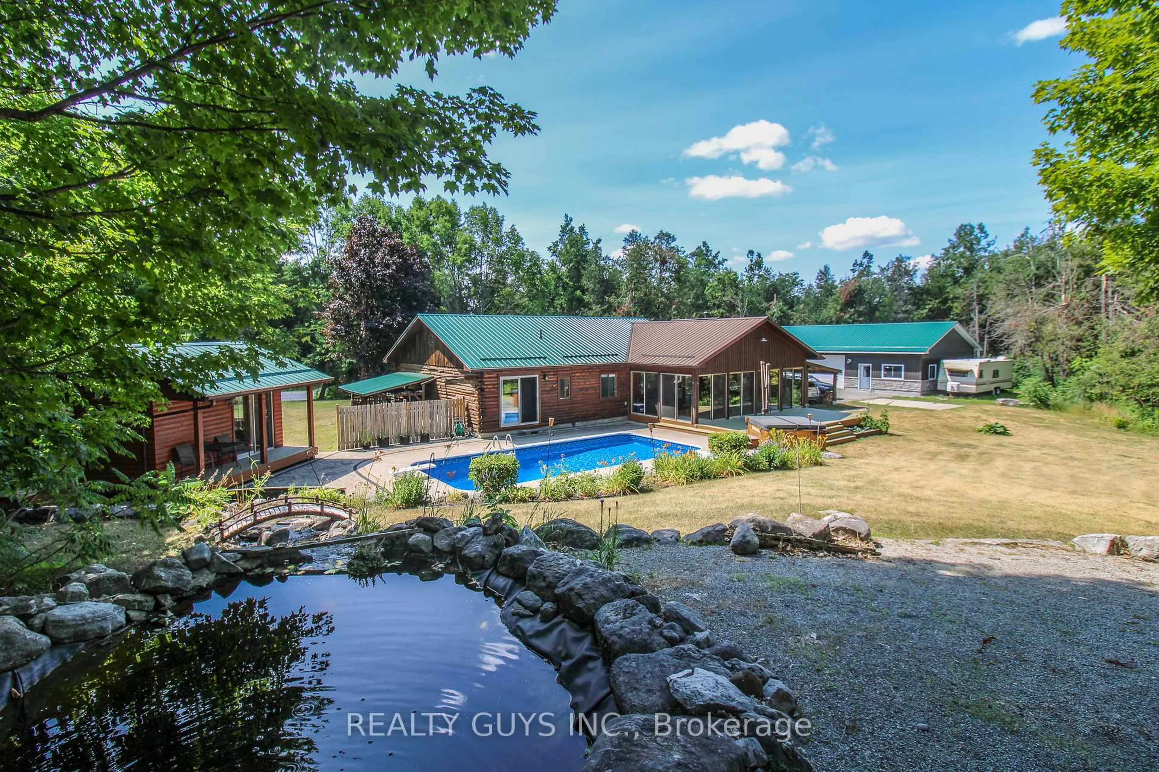 A pic from outside/outdoor area/front of a property/back of a property/a pic from drone, water/lake/river/ocean view for 891 COUNTY Rd, Trent Lakes Ontario K0M 1A0
