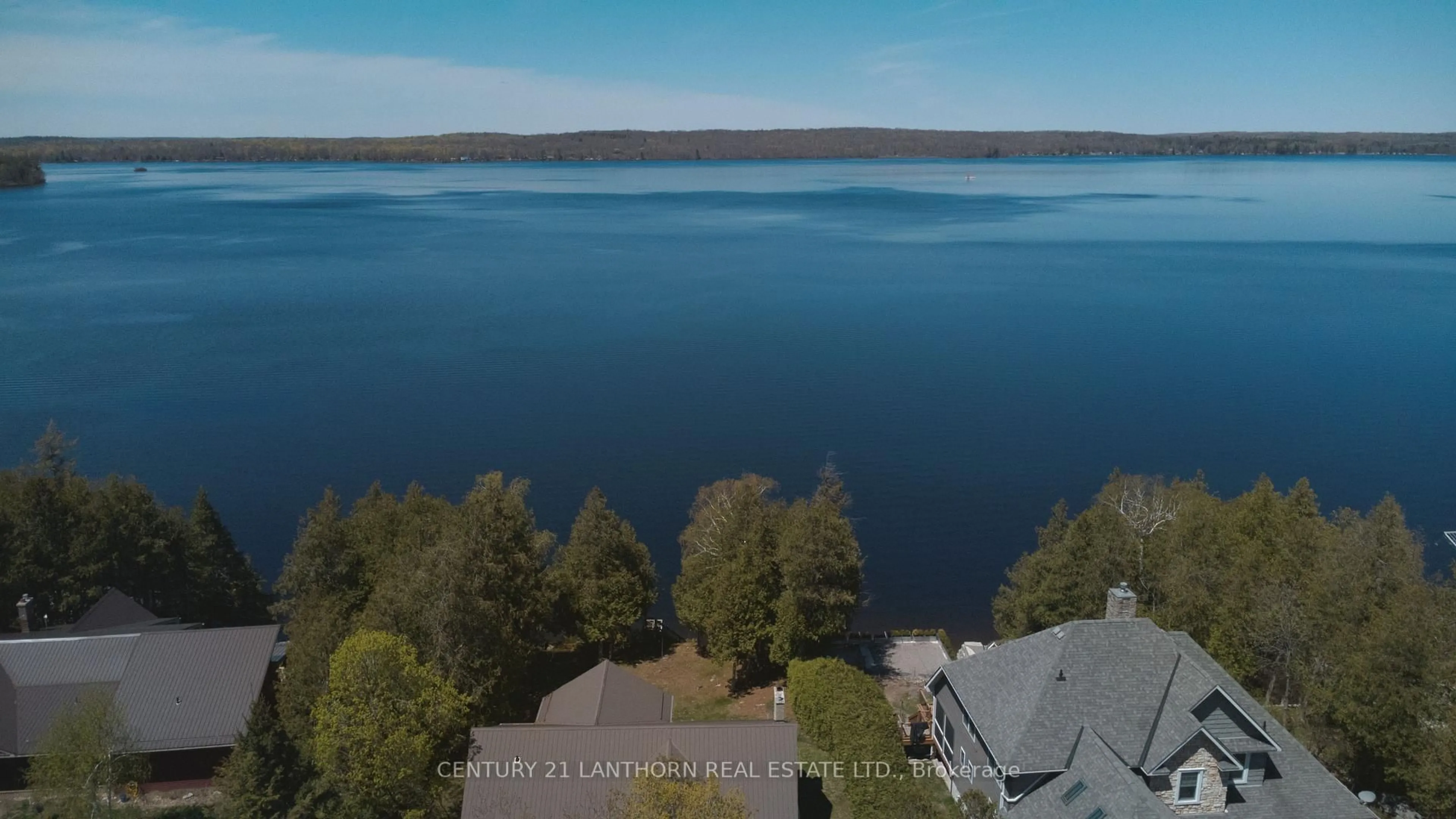 A pic from outside/outdoor area/front of a property/back of a property/a pic from drone, water/lake/river/ocean view for 251 High Shore Rd, Limoges Ontario K0K 2M0