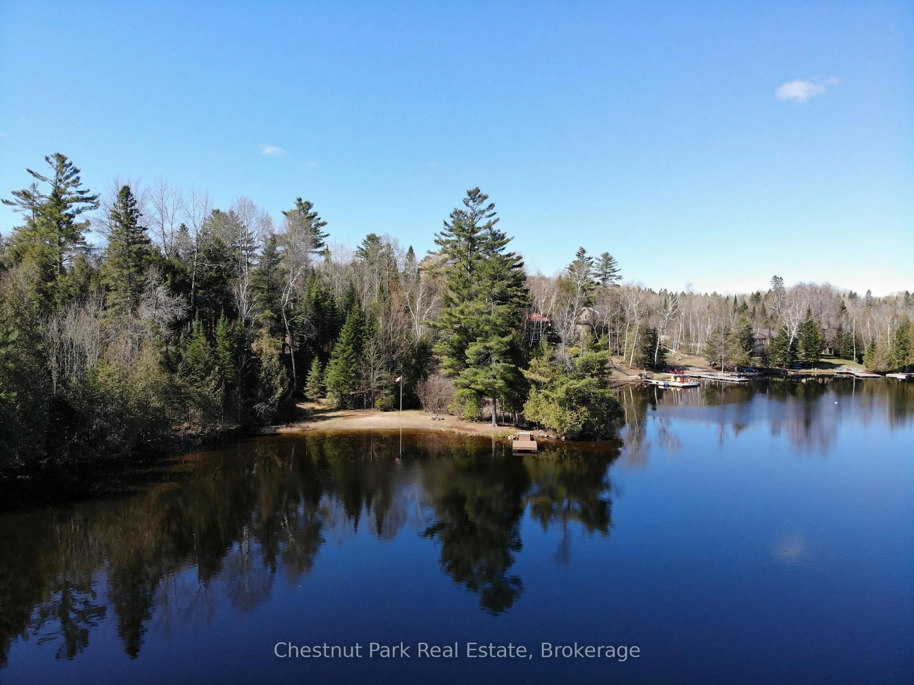 A pic from outside/outdoor area/front of a property/back of a property/a pic from drone, water/lake/river/ocean view for 10453 County Road 503 Rd, Highlands East Ontario K0M 1R0