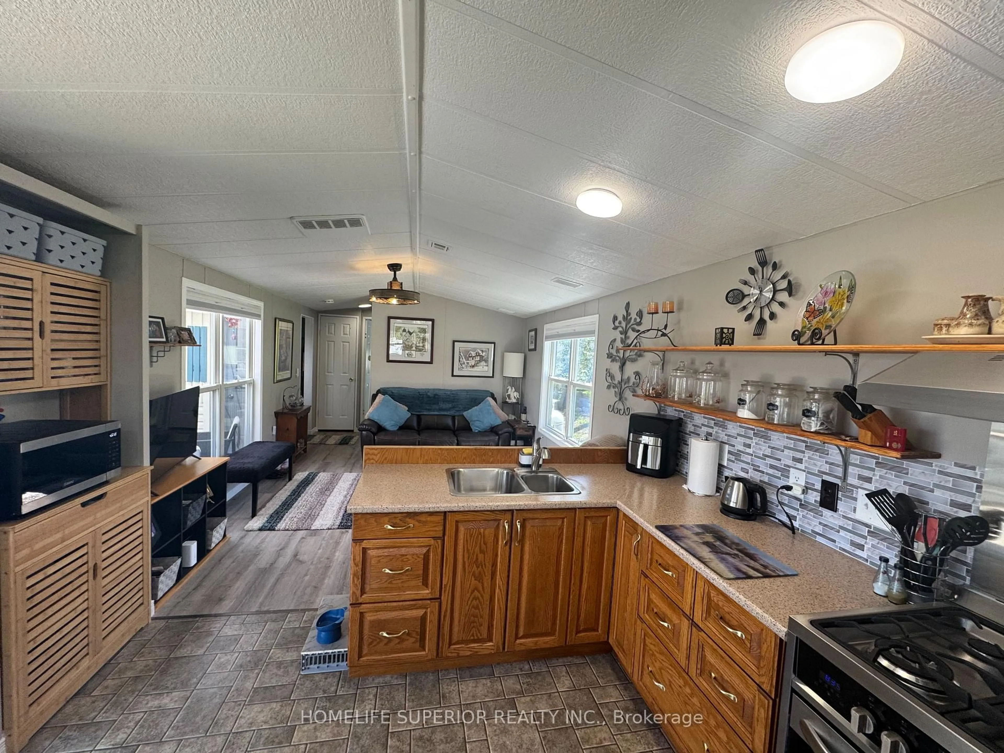 Open concept kitchen, ceramic/tile floor for 485-5139 Halstead Beach Rd #5, Hamilton Township Ontario K0L 1E0