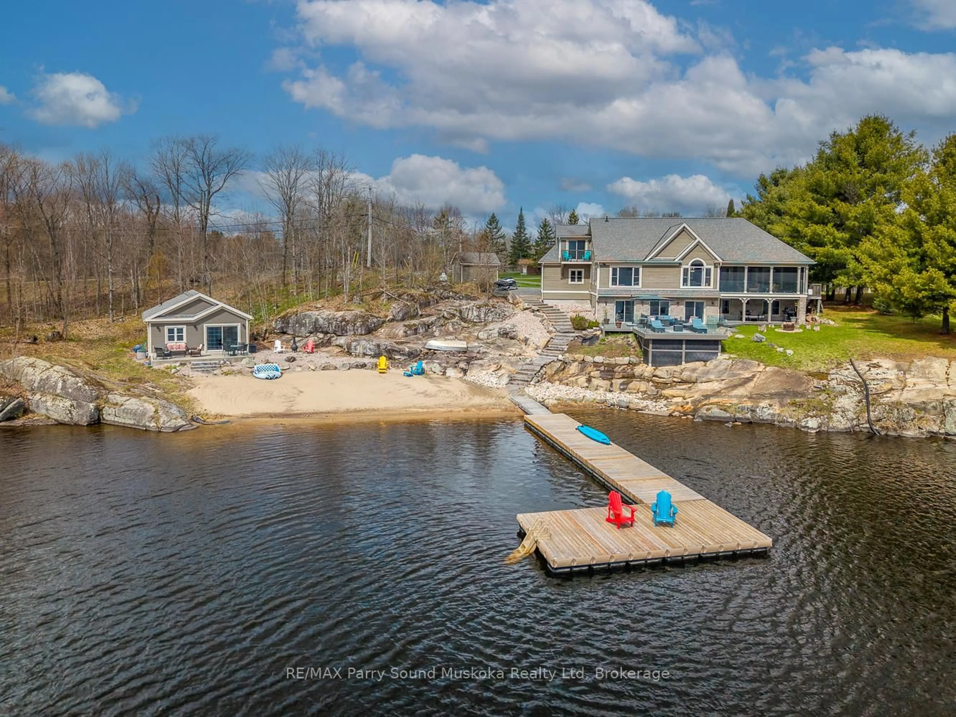 A pic from outside/outdoor area/front of a property/back of a property/a pic from drone, water/lake/river/ocean view for 58 Tait's Island Rd, McKellar Ontario P2A 0B4