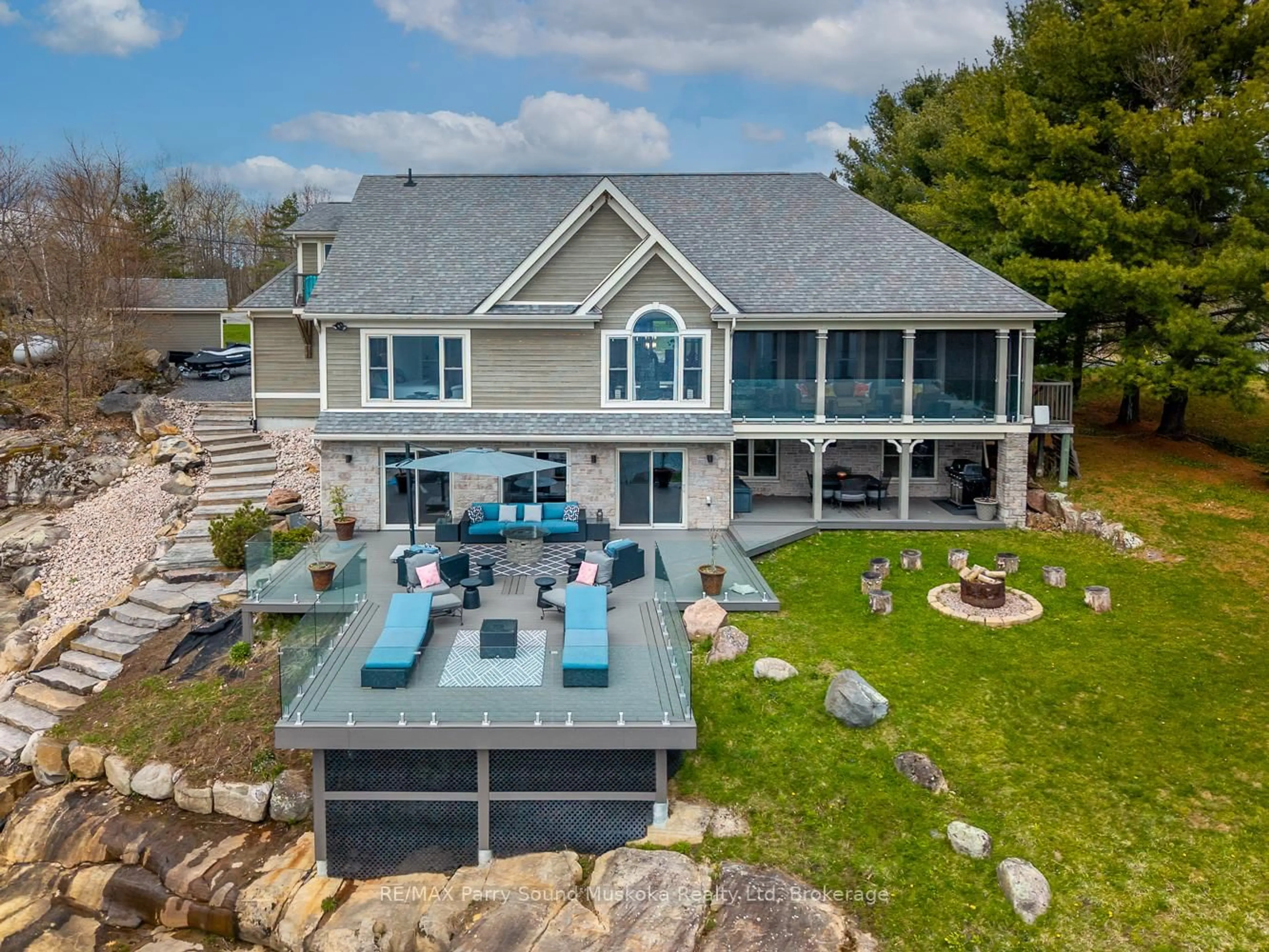 A pic from outside/outdoor area/front of a property/back of a property/a pic from drone, water/lake/river/ocean view for 58 Tait's Island Rd, McKellar Ontario P2A 0B4