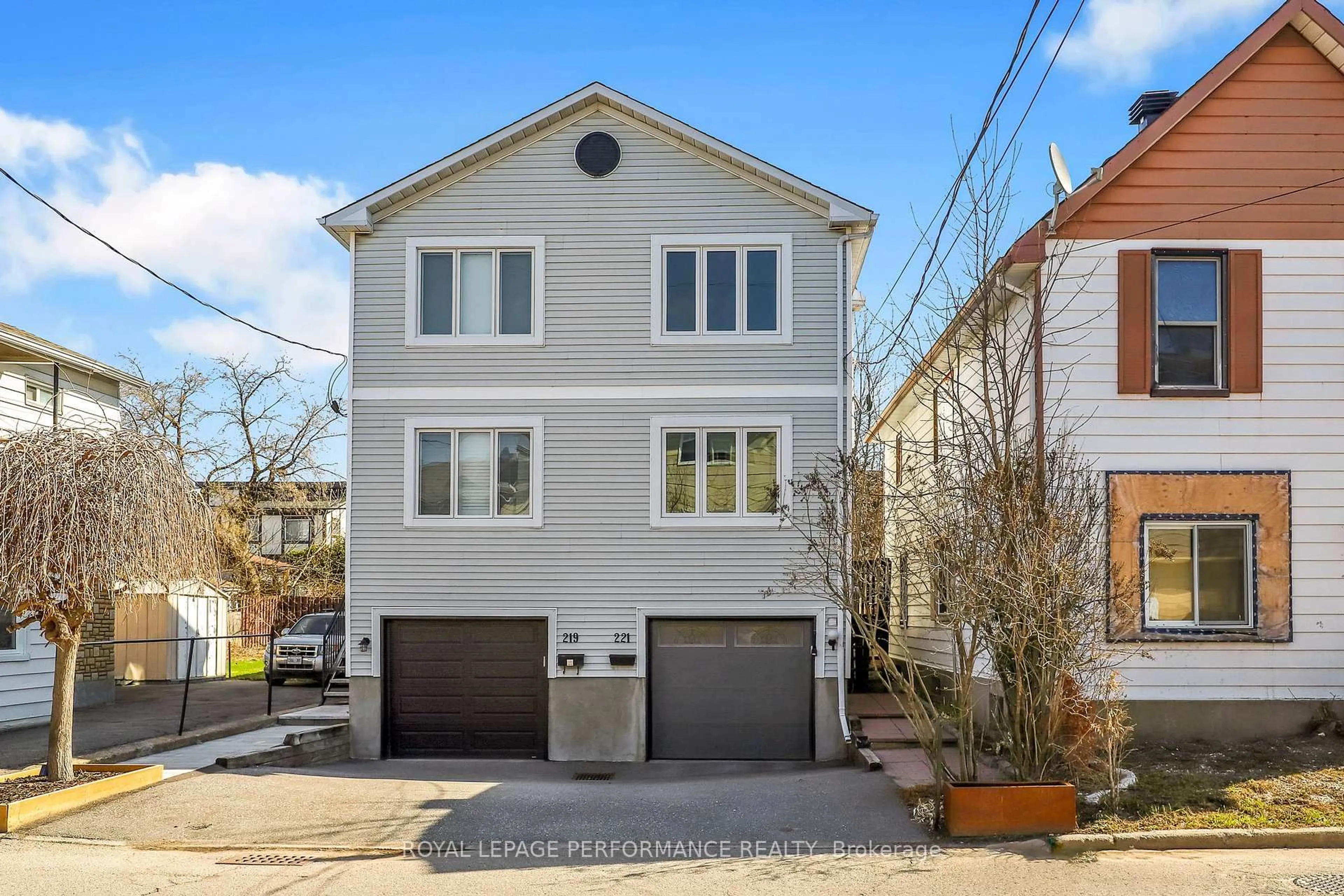 Home with vinyl exterior material, street for 221 Desrosiers St, Ottawa Ontario K1L 7T2