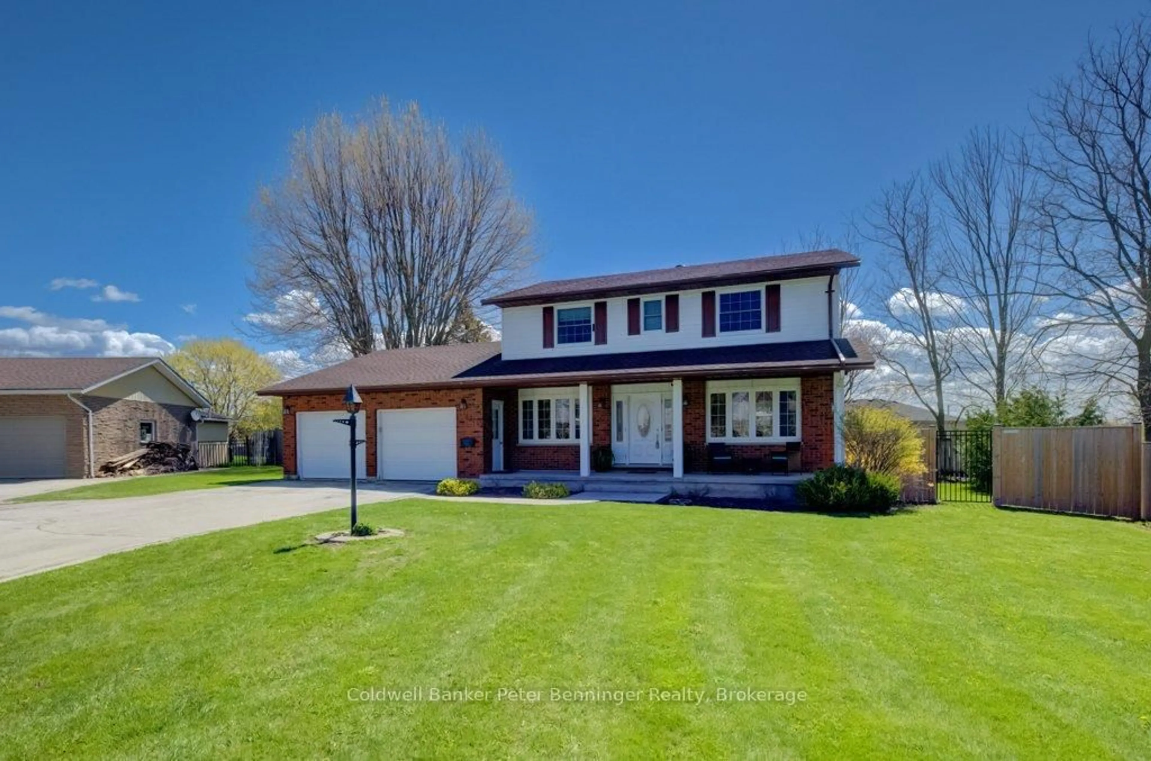 Home with vinyl exterior material, street for 33 Tower Rd, Arran-Elderslie Ontario N0G 1L0