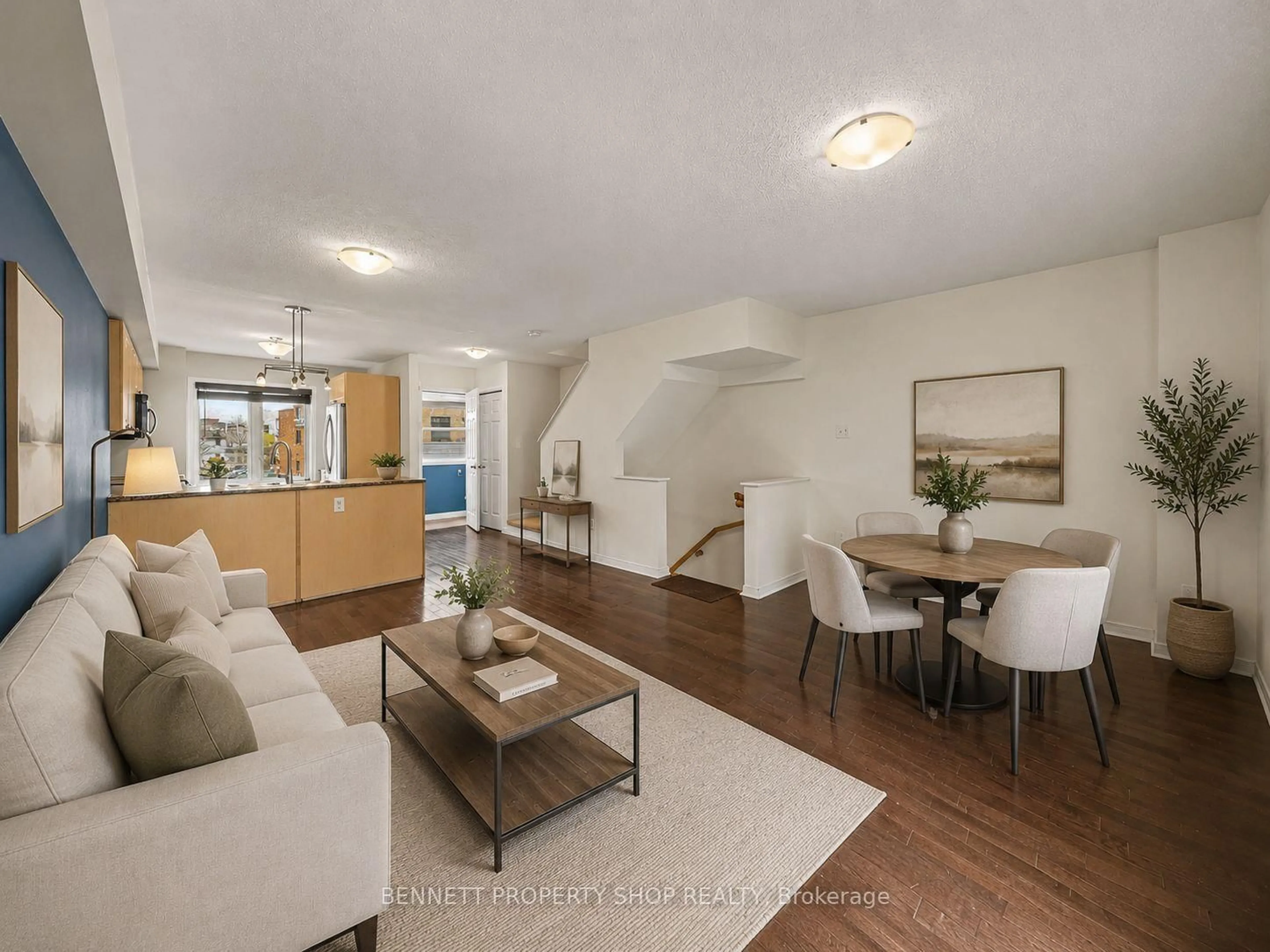 Living room with furniture, wood/laminate floor for 237 Kennevale Dr, Ottawa Ontario K2J 0C3