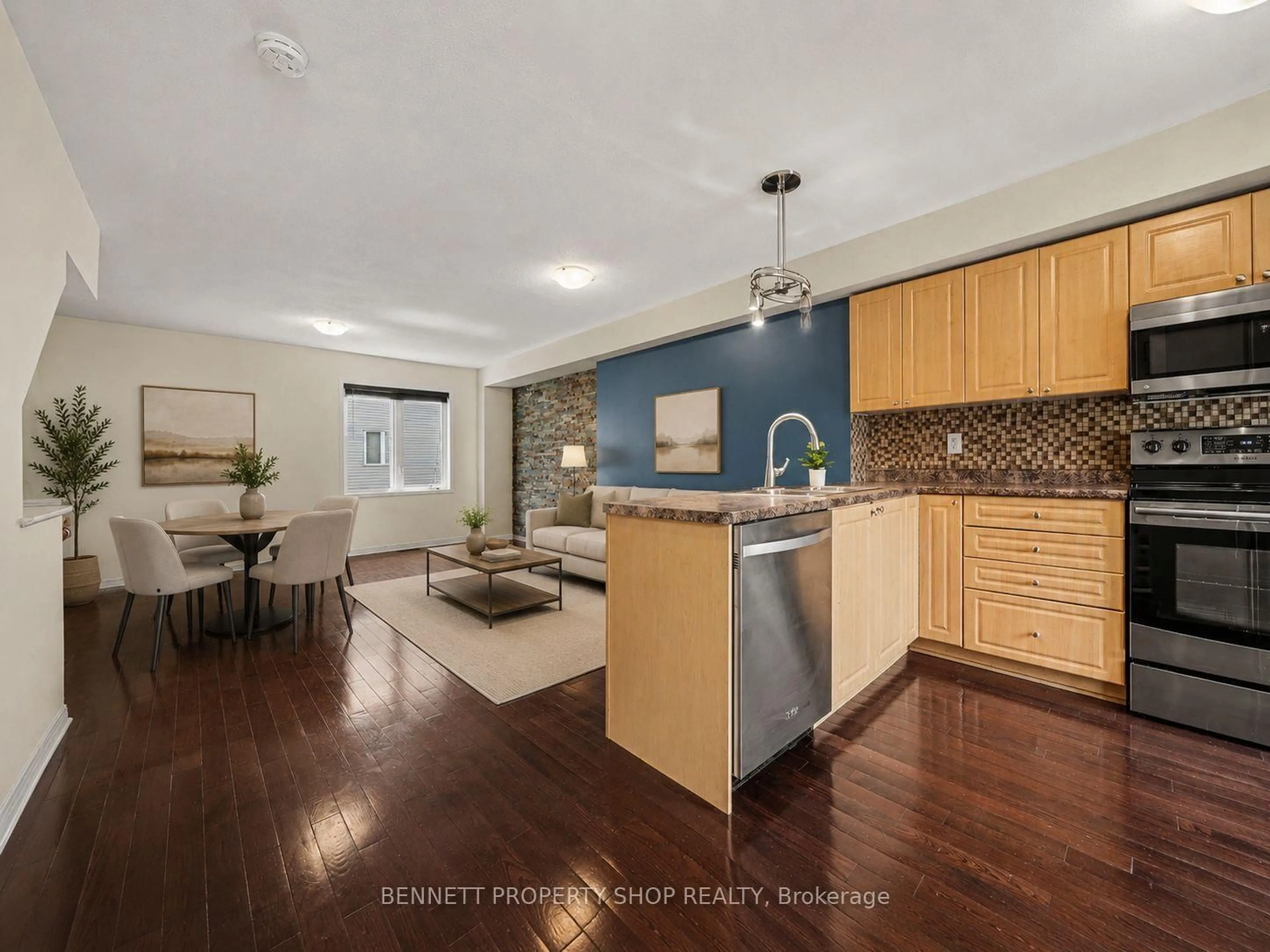Open concept kitchen, wood/laminate floor for 237 Kennevale Dr, Ottawa Ontario K2J 0C3