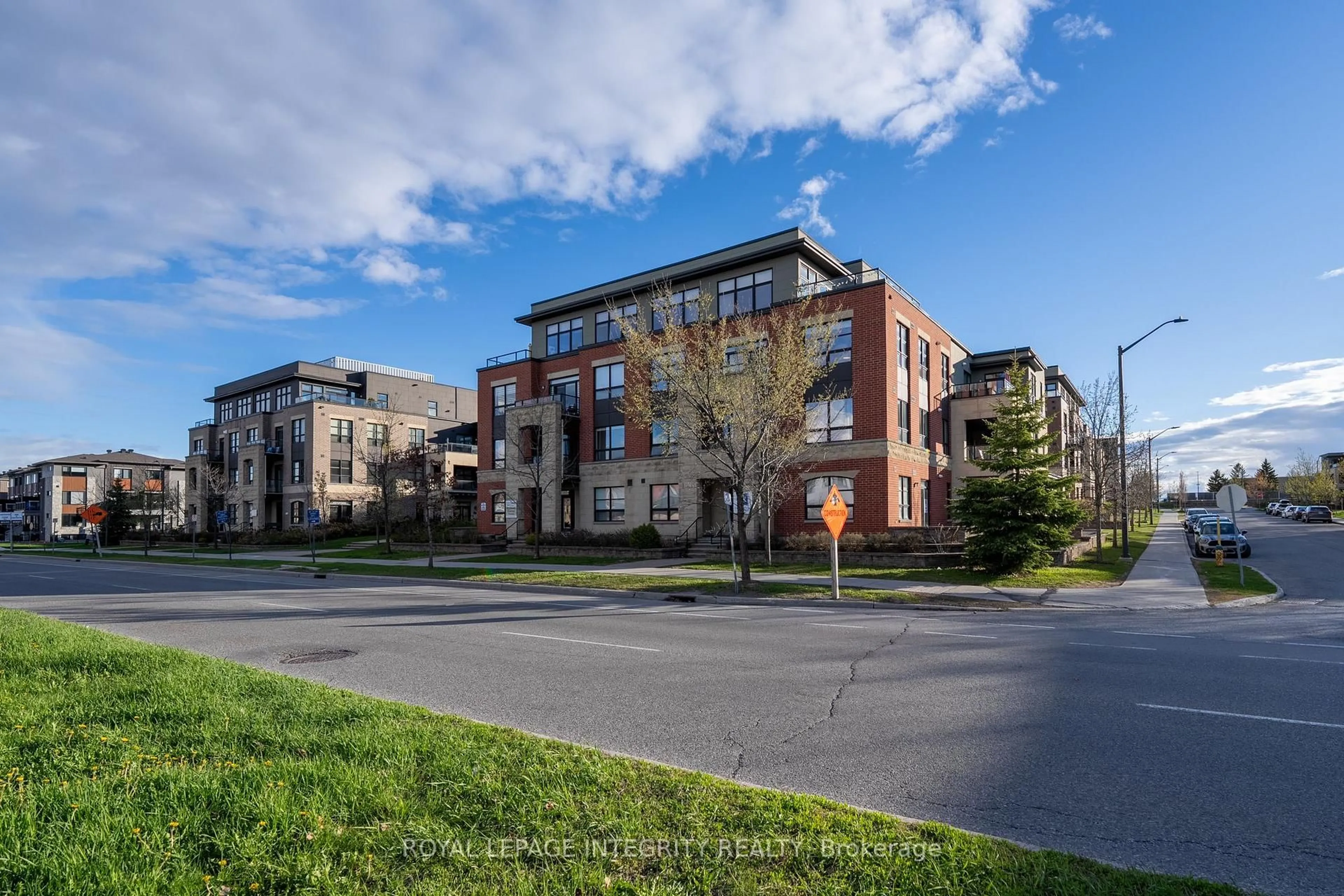 A pic from outside/outdoor area/front of a property/back of a property/a pic from drone, street for 301 Bayrose Dr #305, Nepean Ontario K2J 5W3