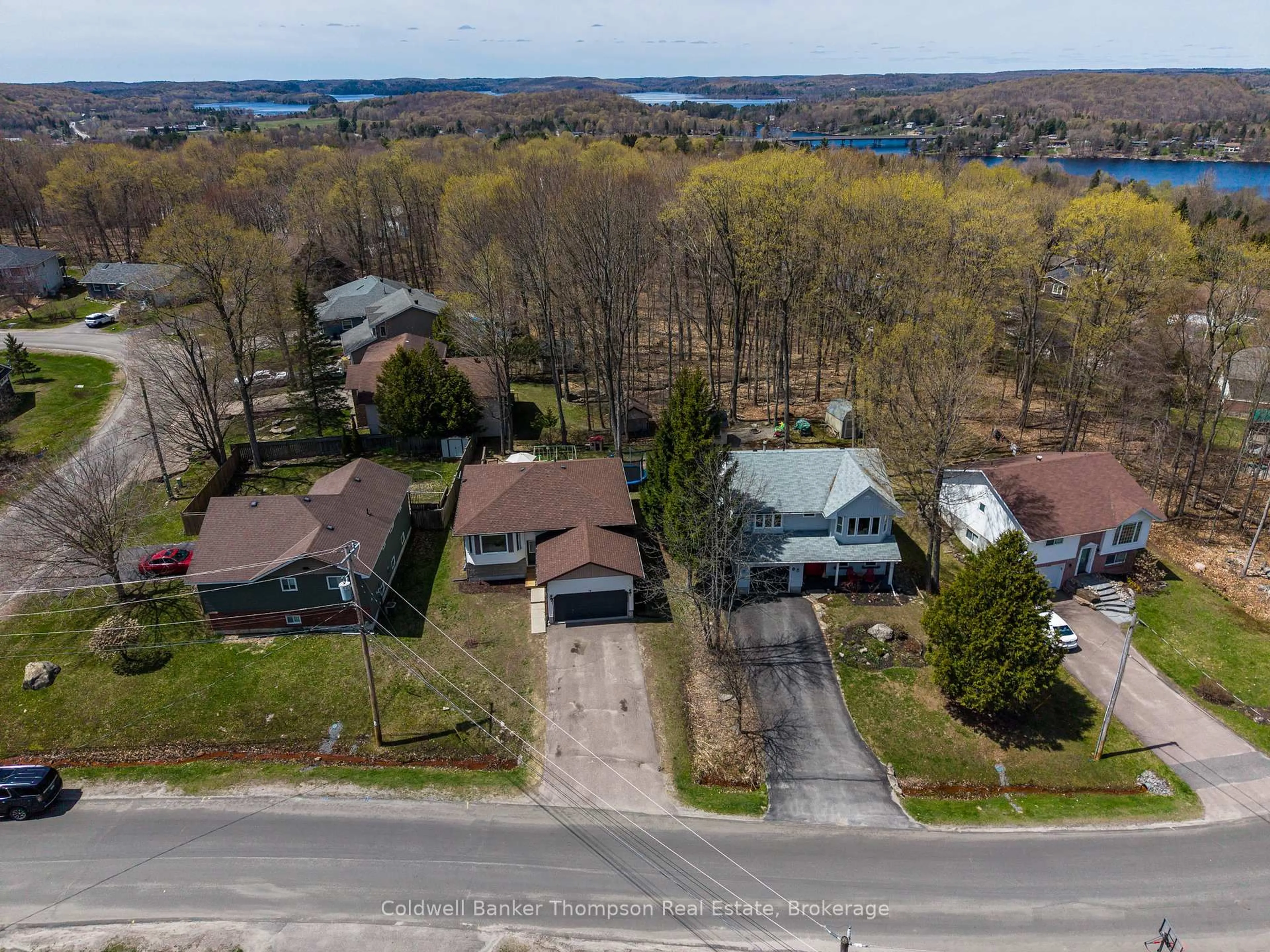 A pic from outside/outdoor area/front of a property/back of a property/a pic from drone, unknown for 36 Southdale Dr, Huntsville Ontario P1H 1P7