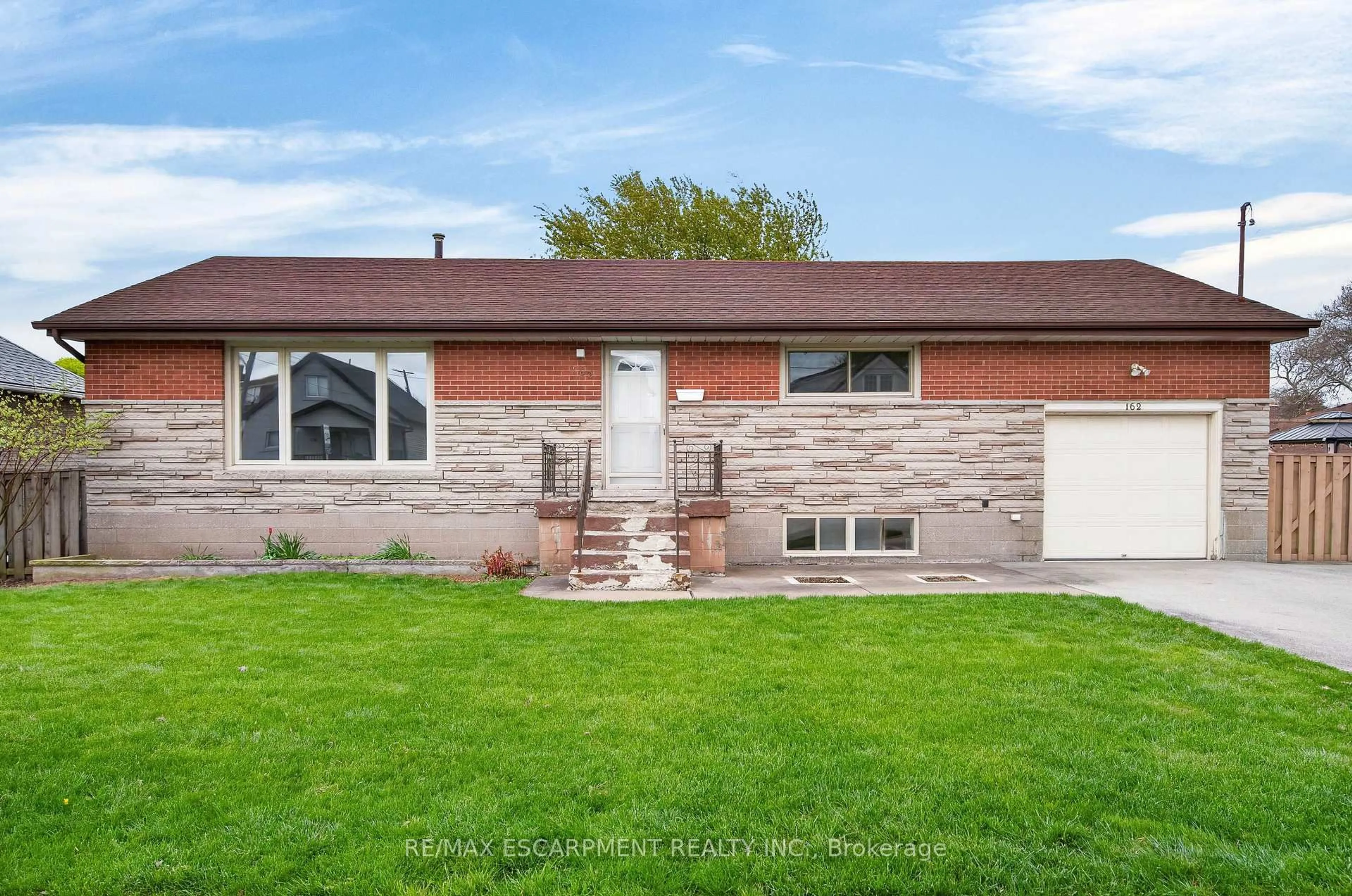 Home with brick exterior material, street for 162 Mountville Ave, Hamilton Ontario L9A 1E7