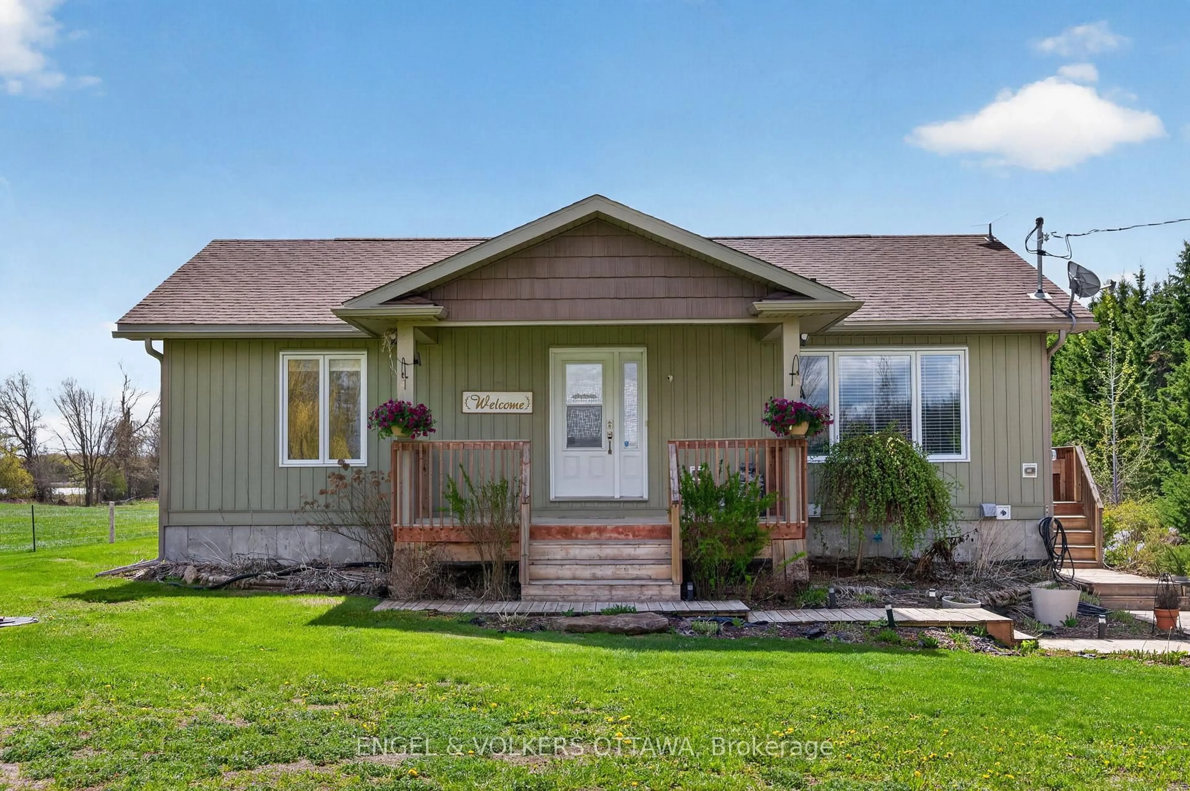 Home with vinyl exterior material, street for 6042 Dobson Lane, Richmond Ontario K0A 2Z0