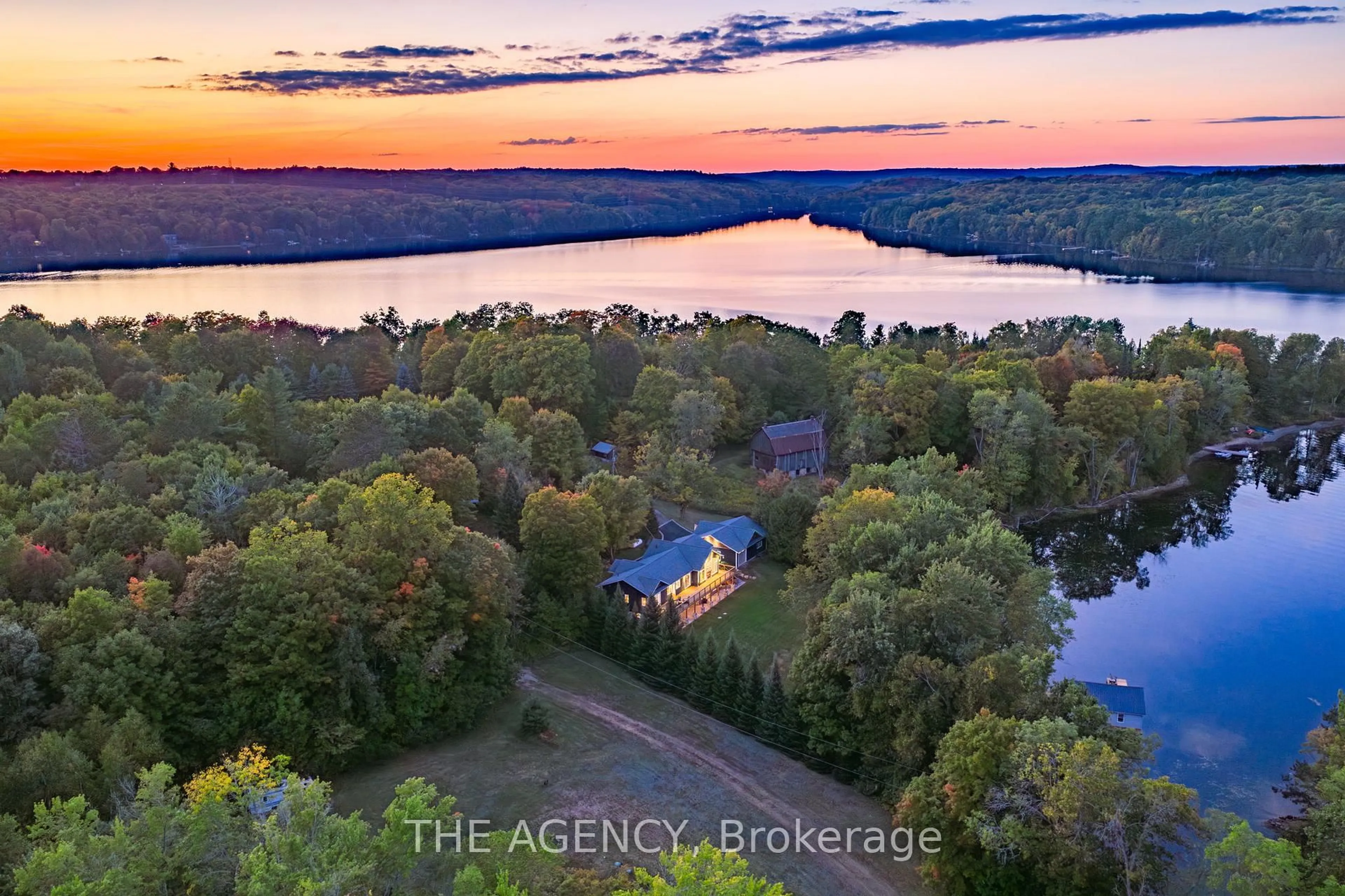 A pic from outside/outdoor area/front of a property/back of a property/a pic from drone, water/lake/river/ocean view for 1158 Camp Gayventure Crt, Minden Hills Ontario K0M 2K0