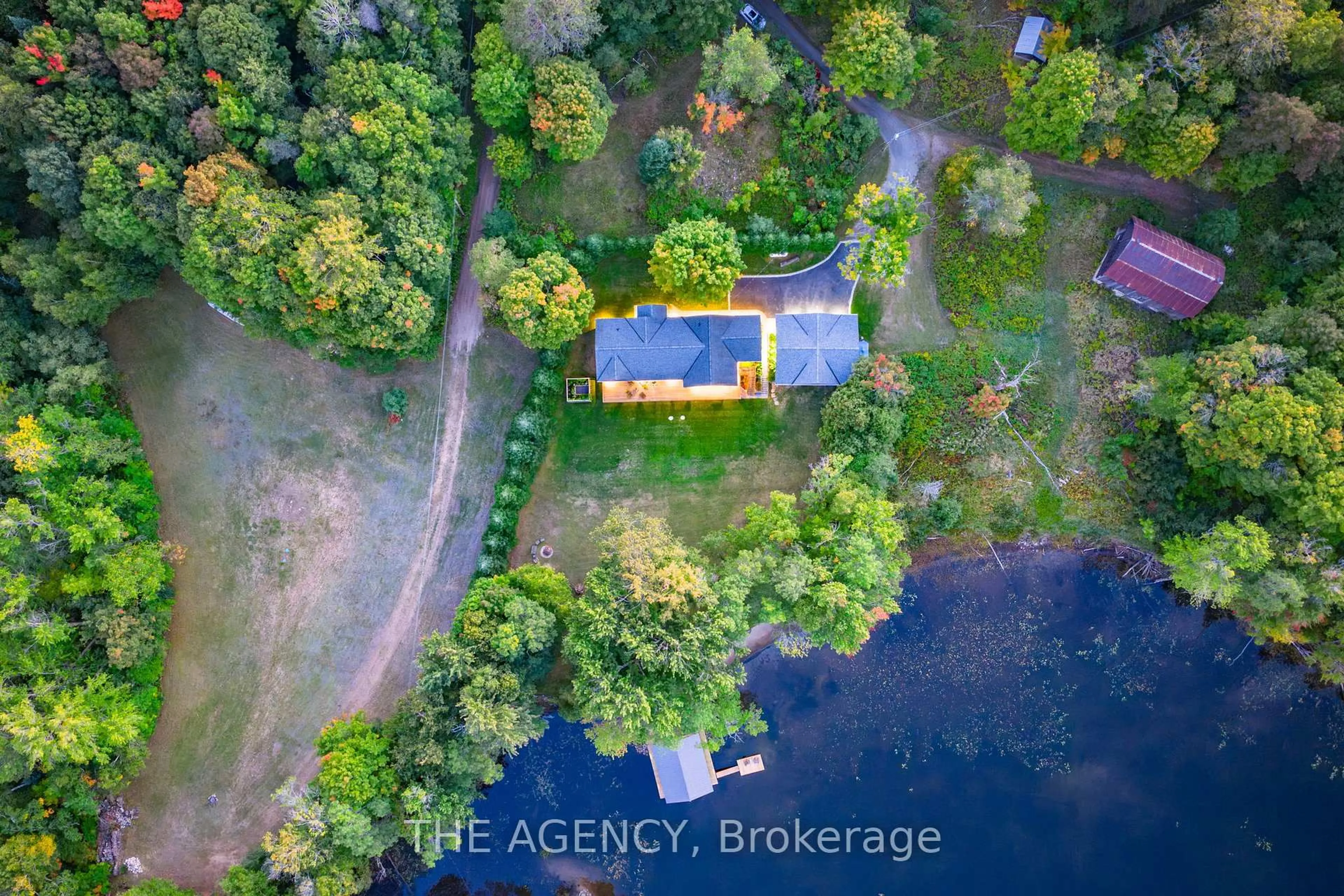 A pic from outside/outdoor area/front of a property/back of a property/a pic from drone, water/lake/river/ocean view for 1158 Camp Gayventure Crt, Minden Hills Ontario K0M 2K0