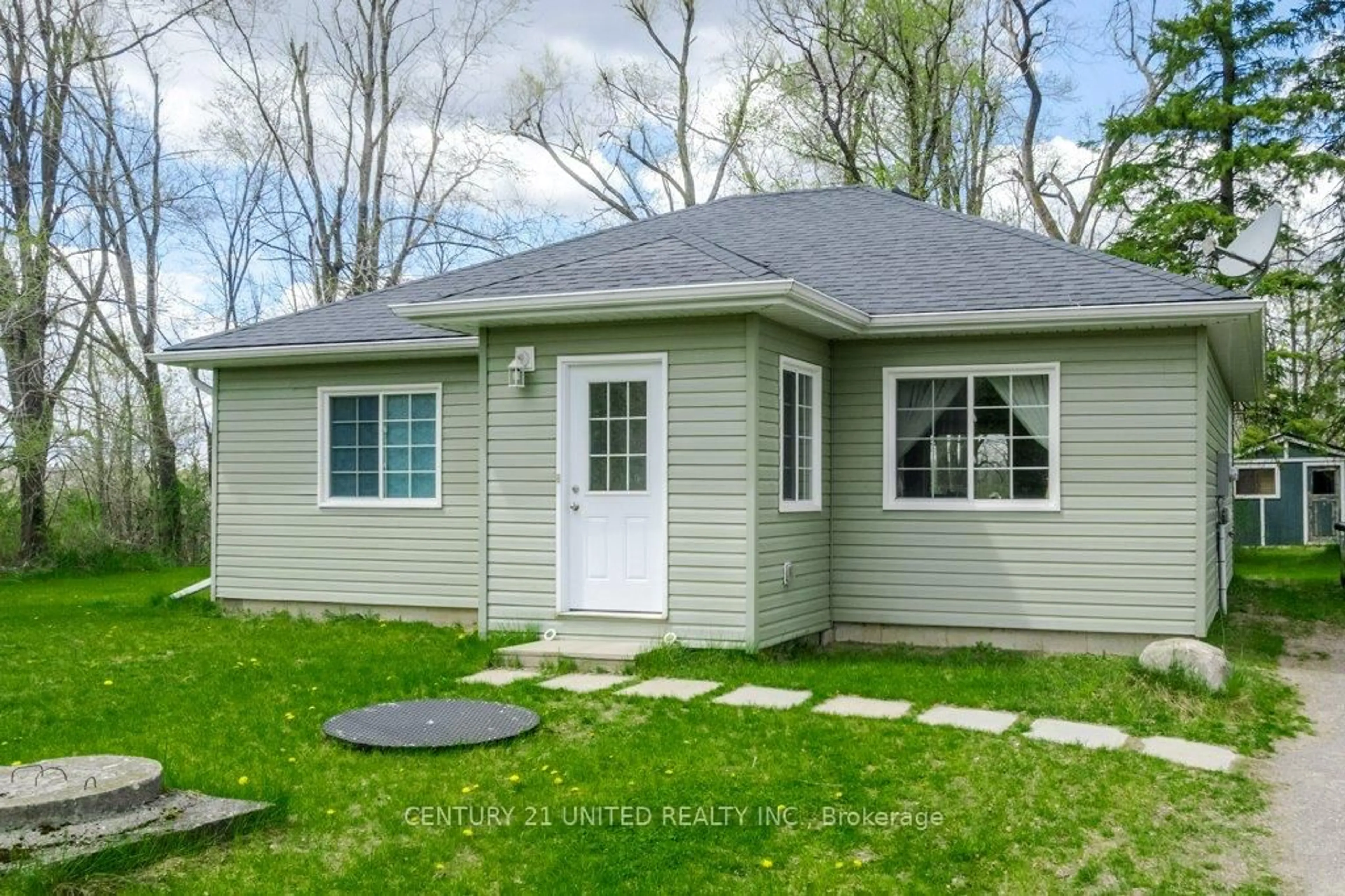 Home with vinyl exterior material, street for 102 14th Line, Trent Hills Ontario K0L 1Z0