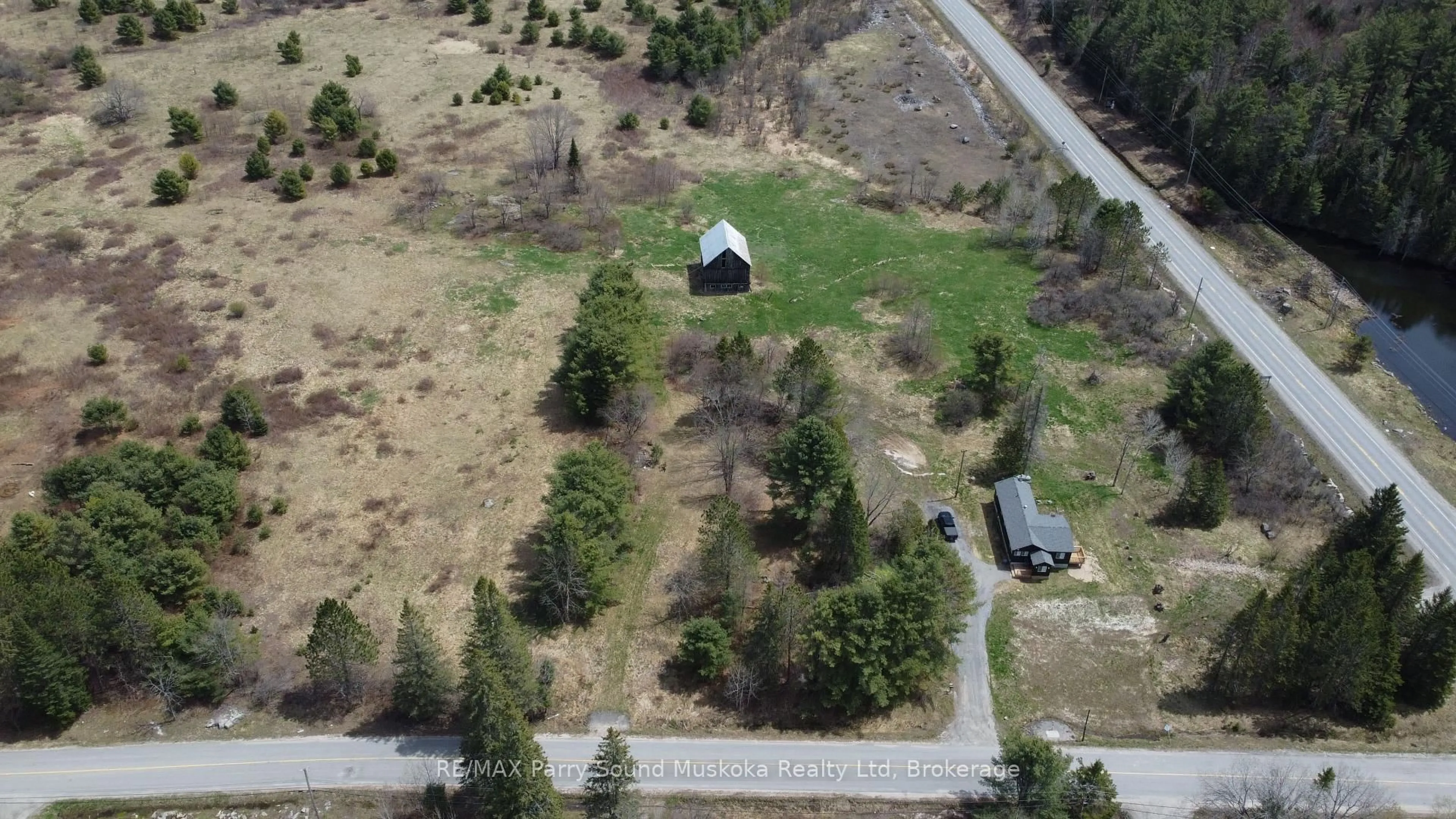 A pic from outside/outdoor area/front of a property/back of a property/a pic from drone, unknown for 582 Turtle Lake Rd, Seguin Ontario P0C 1J0