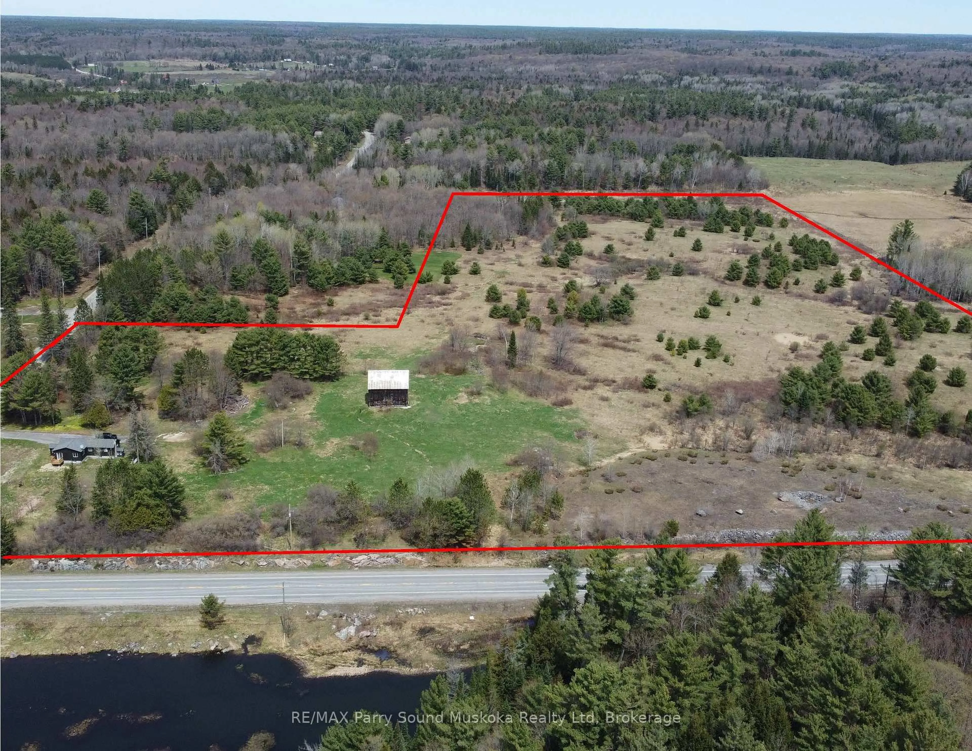 A pic from outside/outdoor area/front of a property/back of a property/a pic from drone, forest/trees view for 582 Turtle Lake Rd, Seguin Ontario P0C 1J0