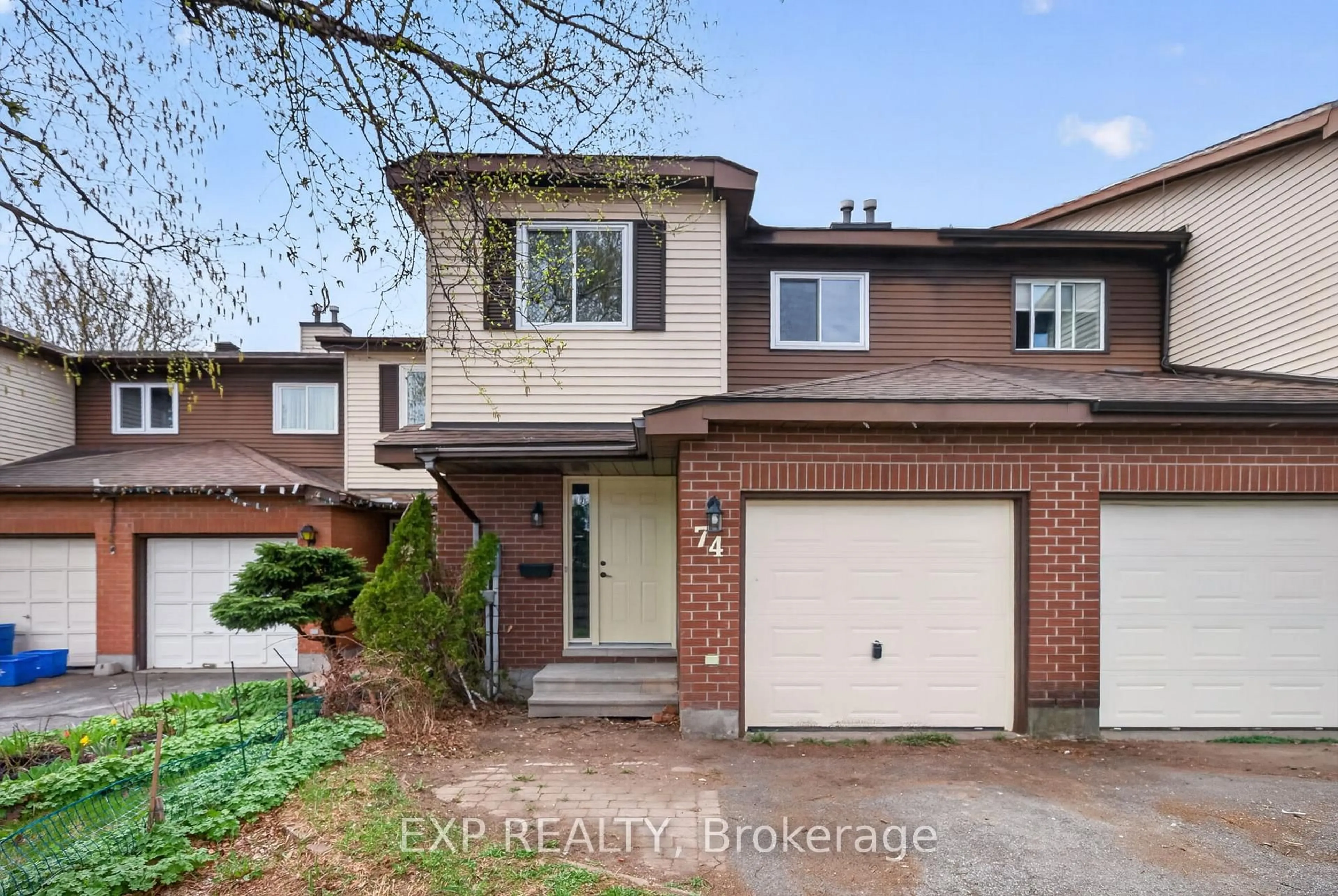 Home with brick exterior material, street for 74 Shearer Cres, Kanata Ontario K2L 3N1