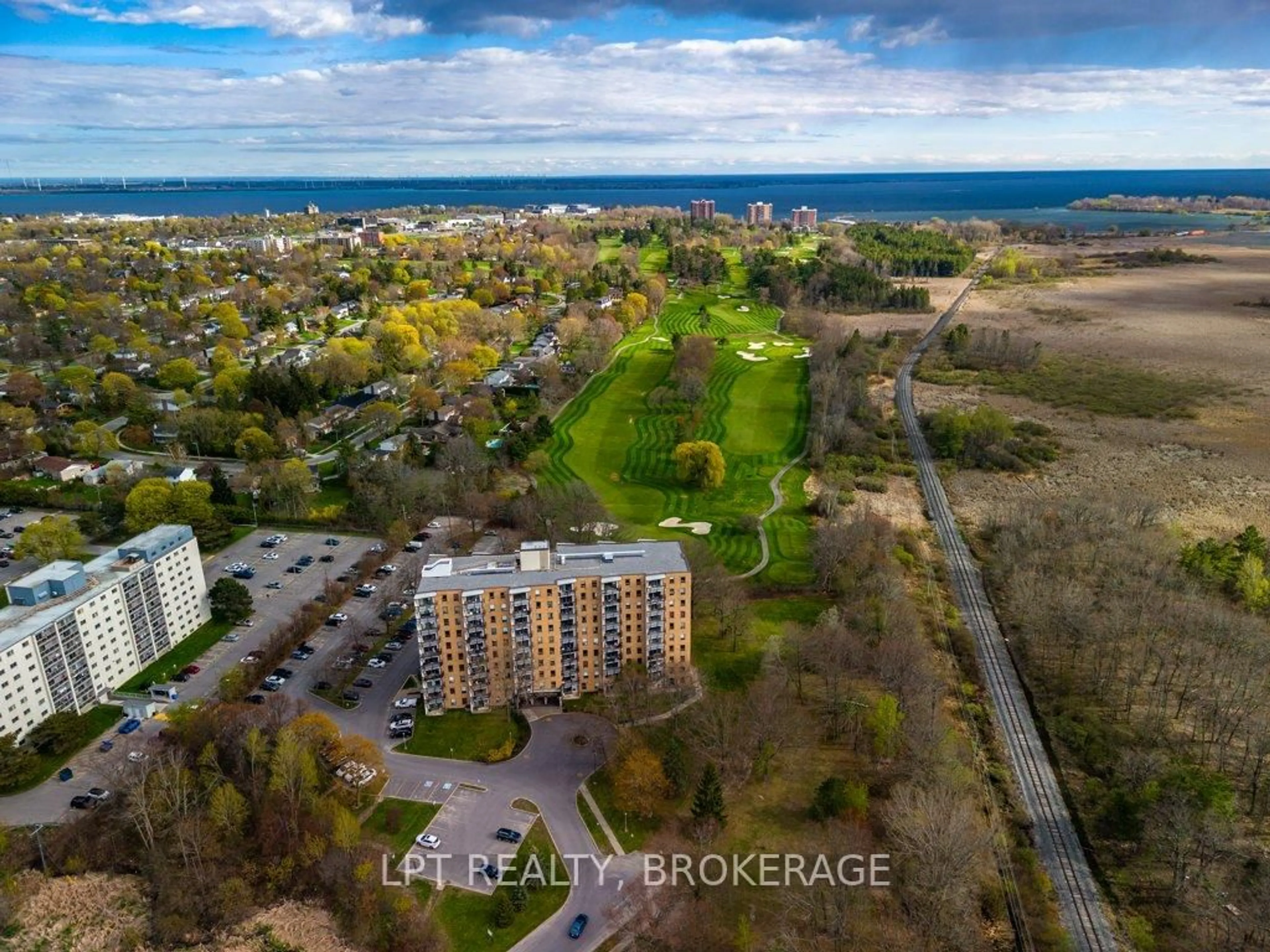 A pic from outside/outdoor area/front of a property/back of a property/a pic from drone, water/lake/river/ocean view for 66 Greenview Dr #208, Kingston Ontario K7M 7C5