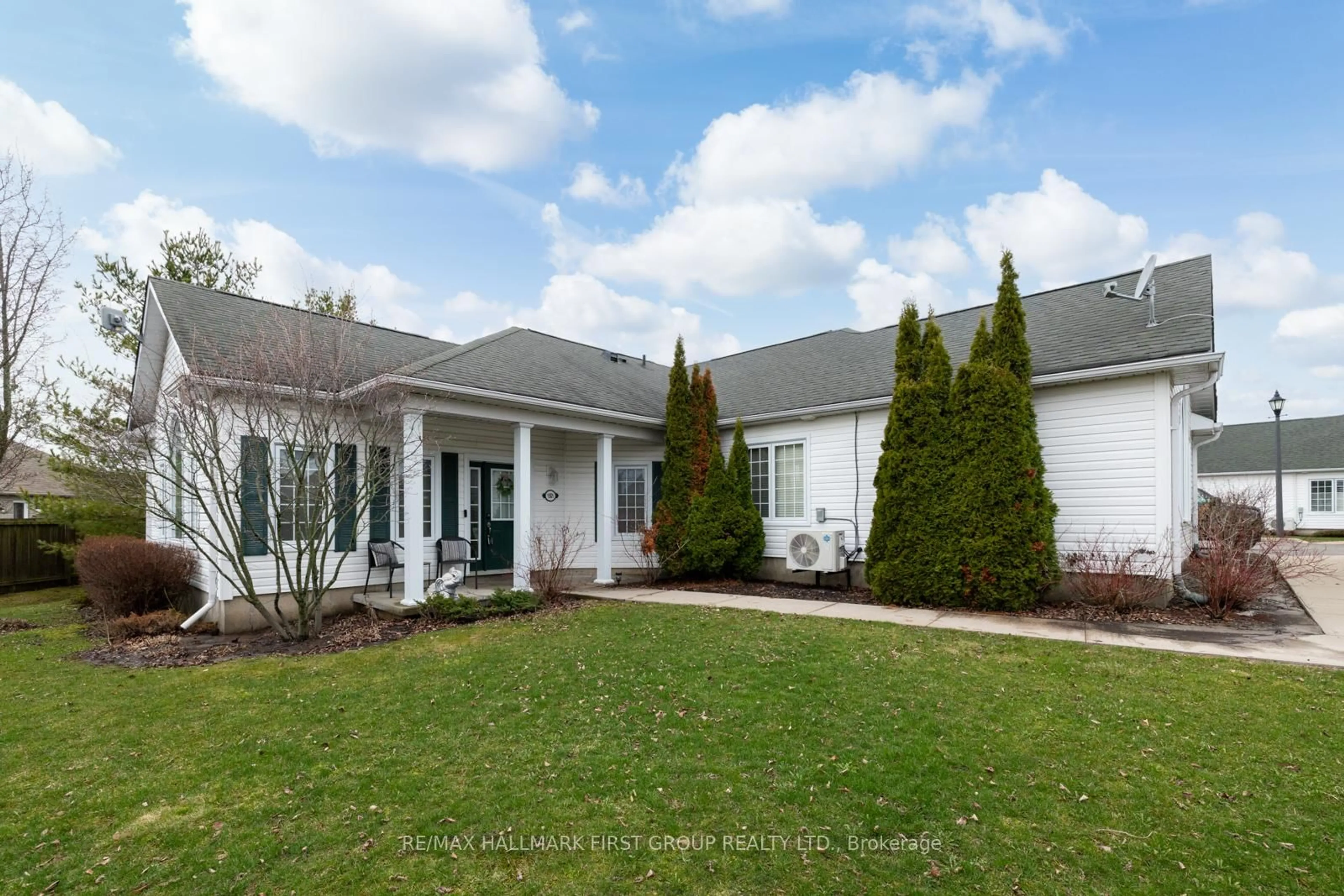 Home with vinyl exterior material, street for 325 Densmore Rd #1501, Cobourg Ontario K9A 0E4