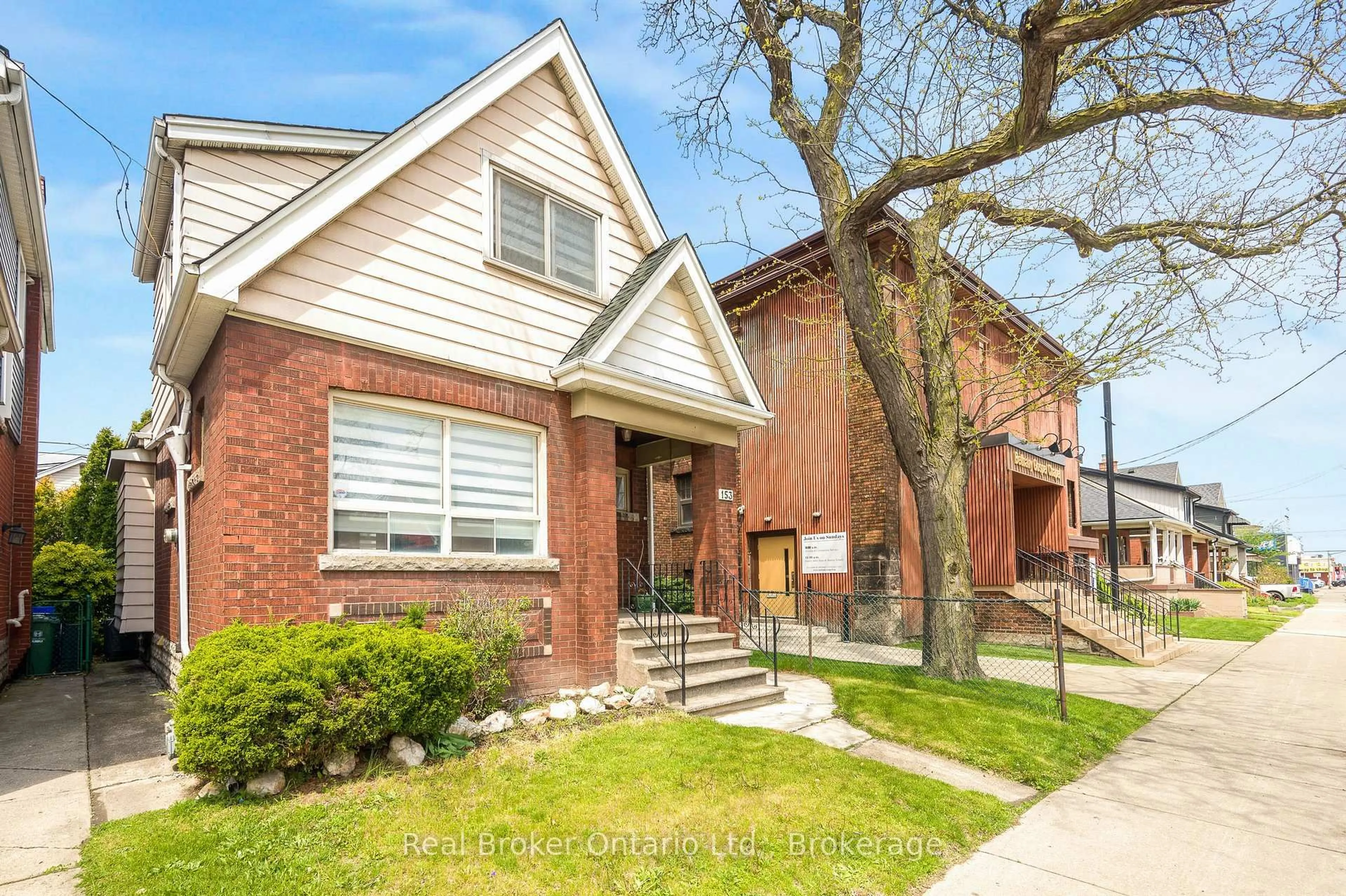 Home with brick exterior material, street for 153 Gage Ave, Hamilton Ontario L8L 7A3