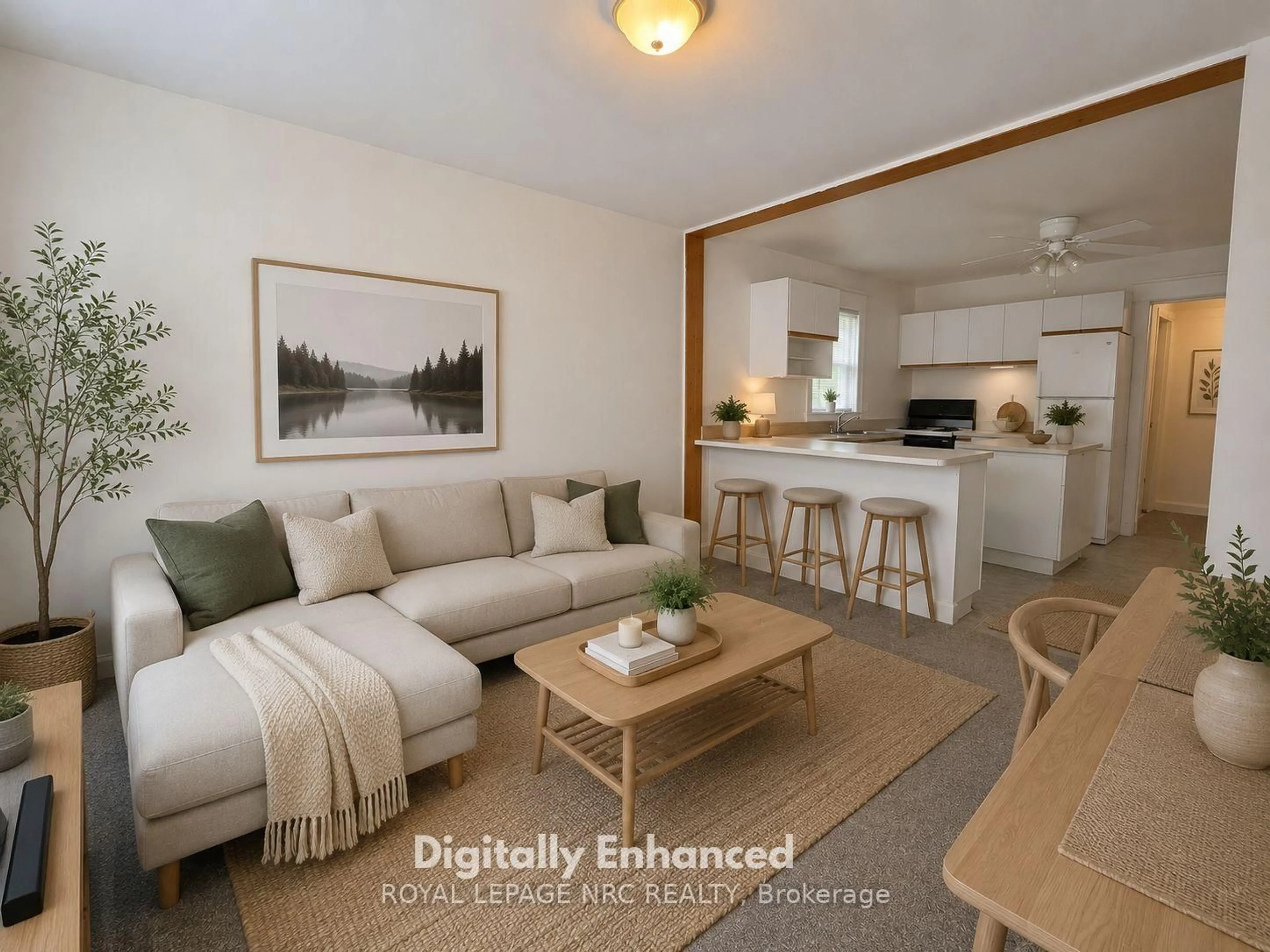 Living room with furniture, wood/laminate floor for 39 Manchester Ave, St. Catharines Ontario L2R 1N9