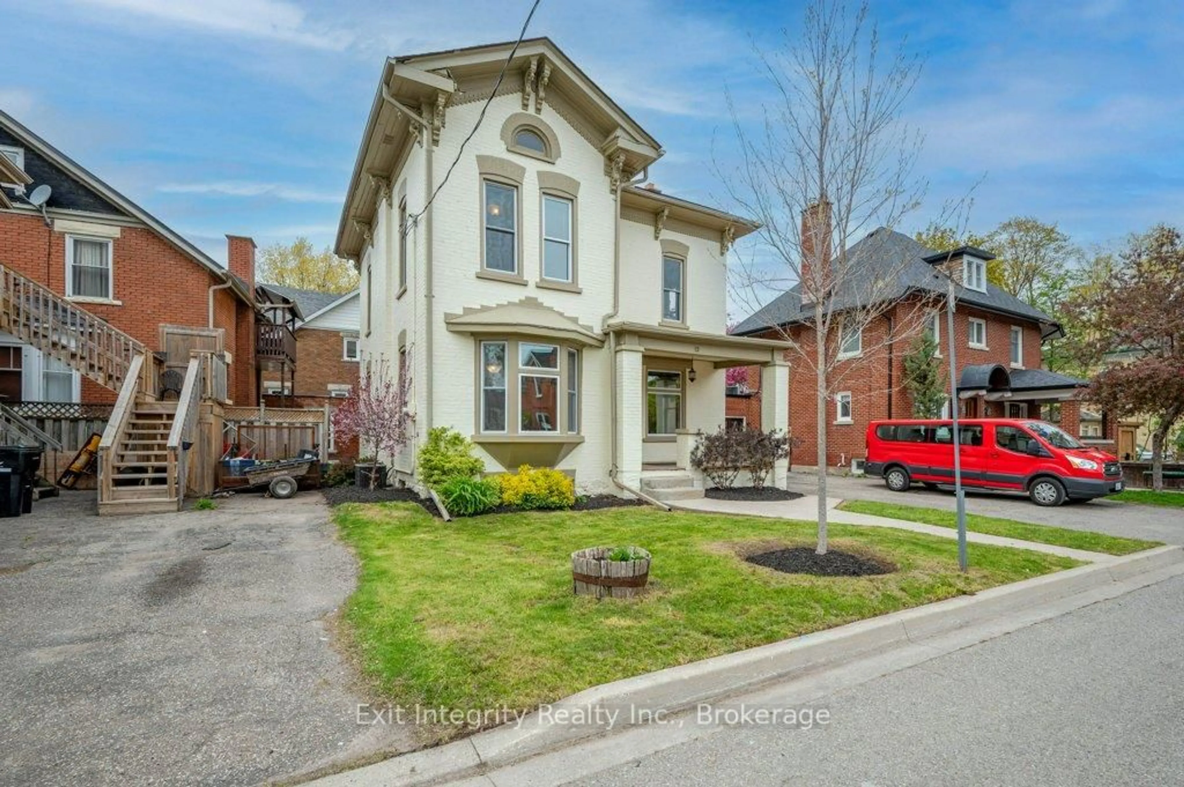 Home with brick exterior material, street for 12 Clarence Pl, Kitchener Ontario N2H 2L2