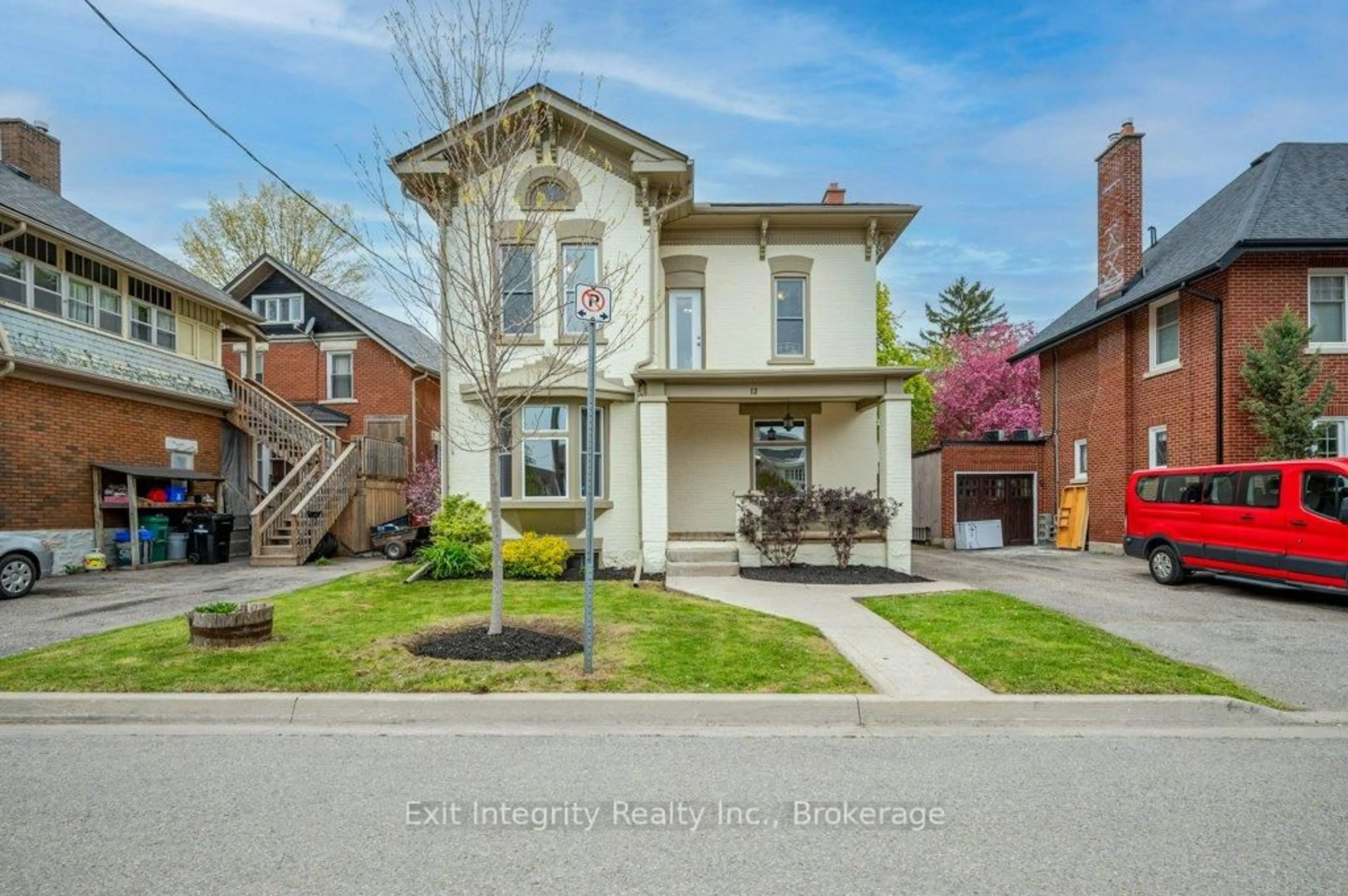Home with brick exterior material, street for 12 Clarence Pl, Kitchener Ontario N2H 2L2