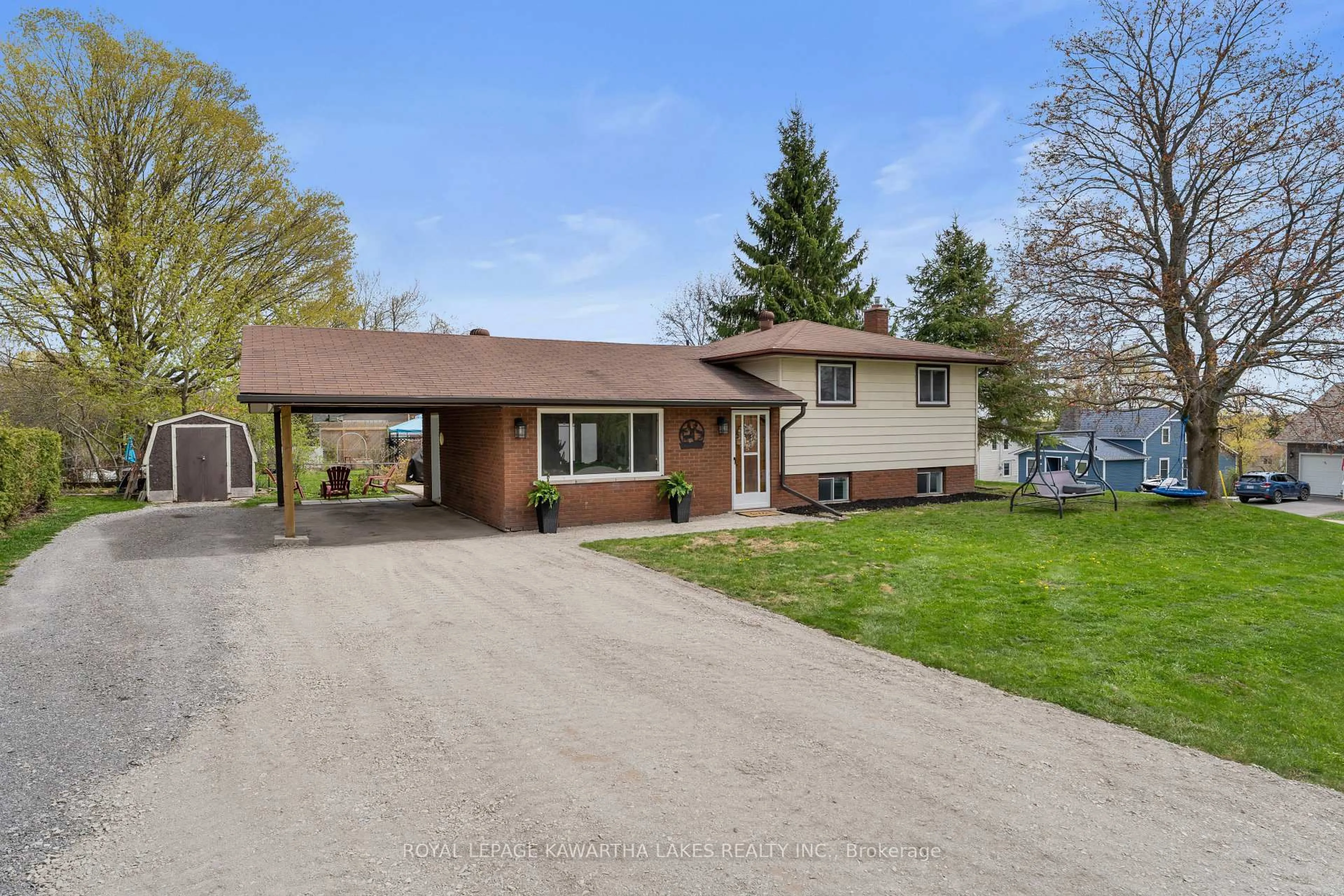 Home with brick exterior material, street for 2 Kennedy Dr, Kawartha Lakes Ontario K0M 1N0