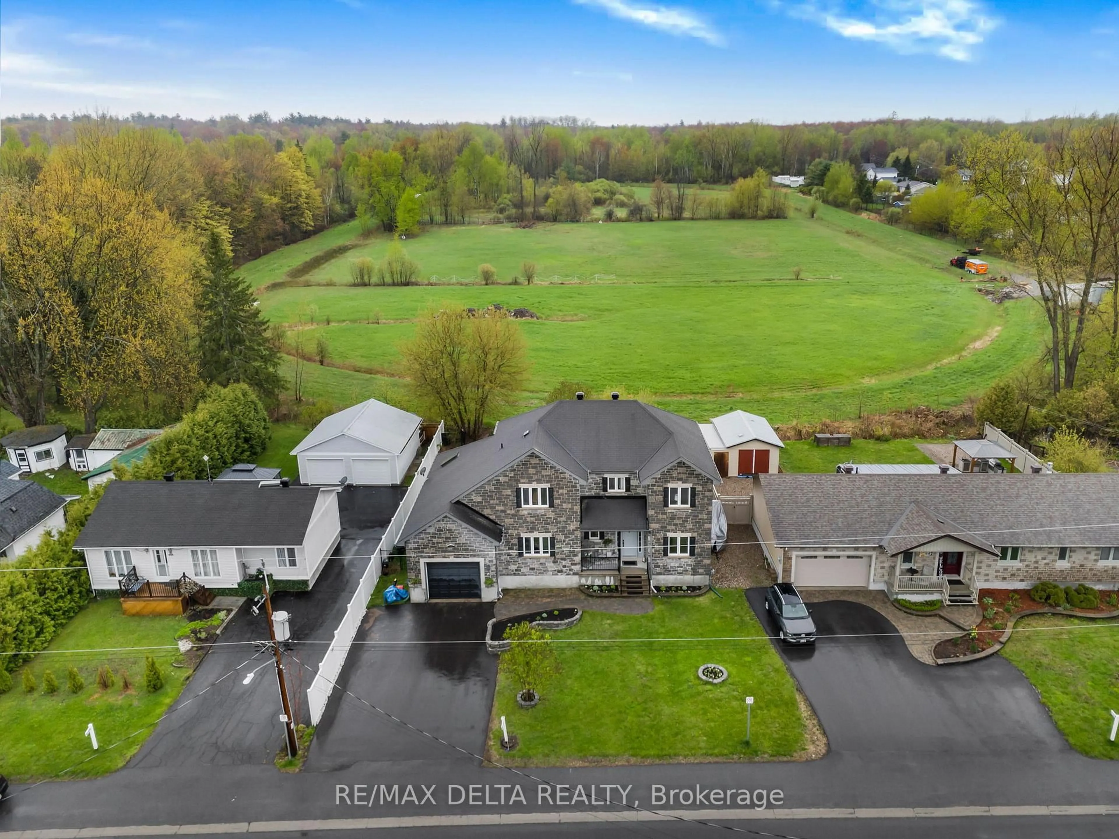 A pic from outside/outdoor area/front of a property/back of a property/a pic from drone, unknown for 1820 LANDRY Rd, Clarence-Rockland Ontario K0A 1N0