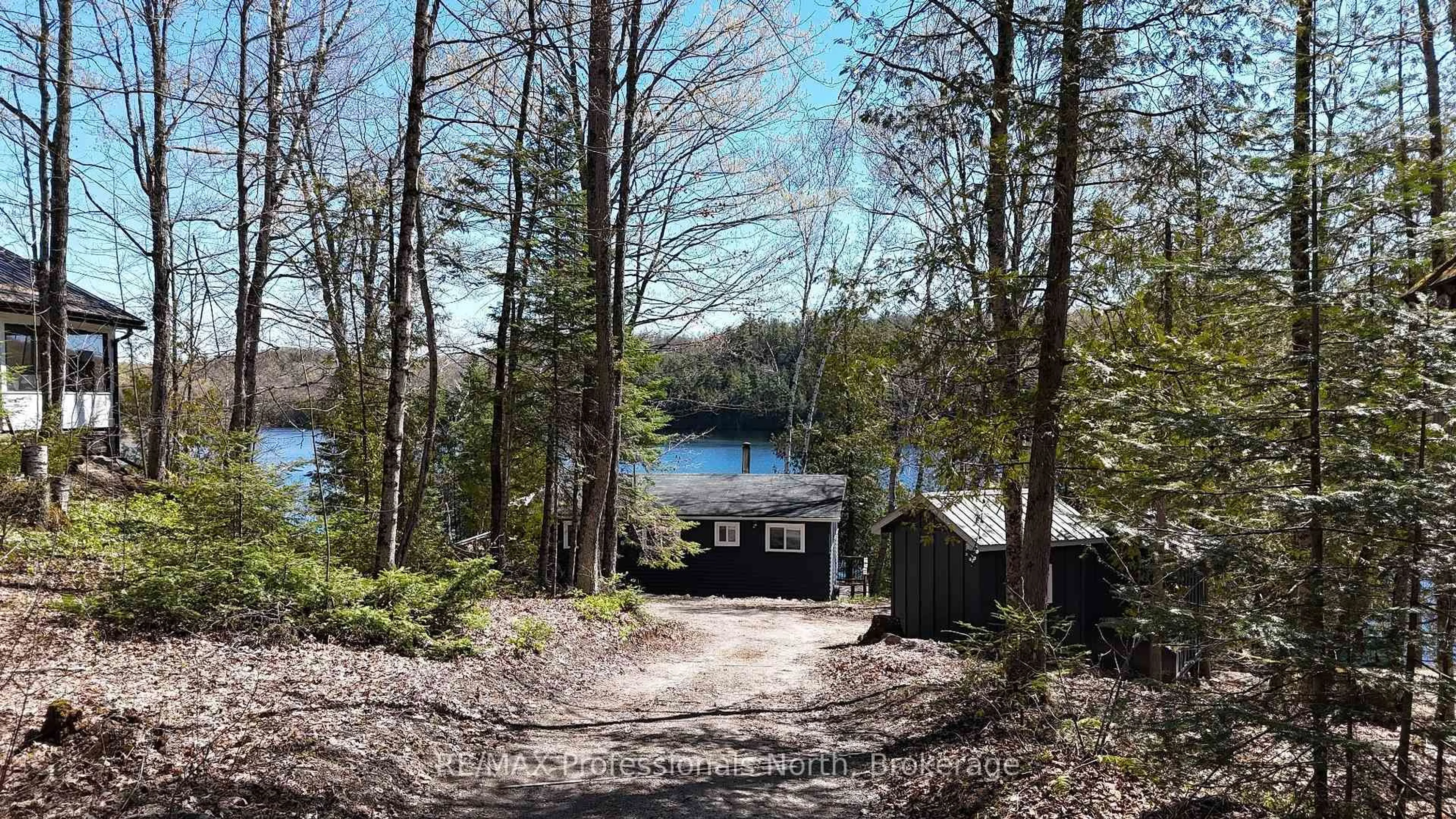 A pic from outside/outdoor area/front of a property/back of a property/a pic from drone, forest/trees view for 1080 Heart's Content Dr, Highlands East Ontario K0M 1X0