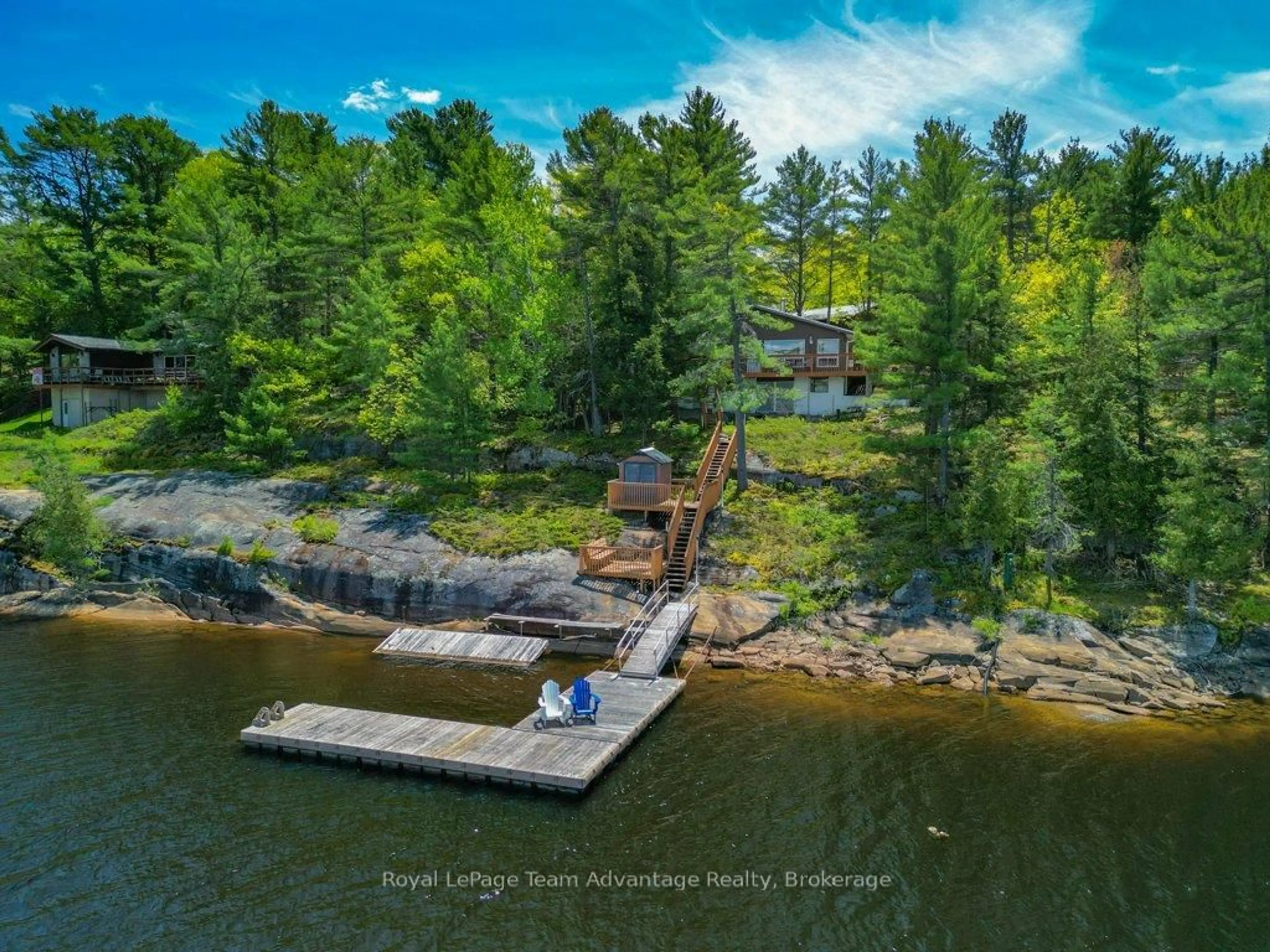 A pic from outside/outdoor area/front of a property/back of a property/a pic from drone, water/lake/river/ocean view for 47 Ridgeway Dr, Carling Ontario P0G 1G0