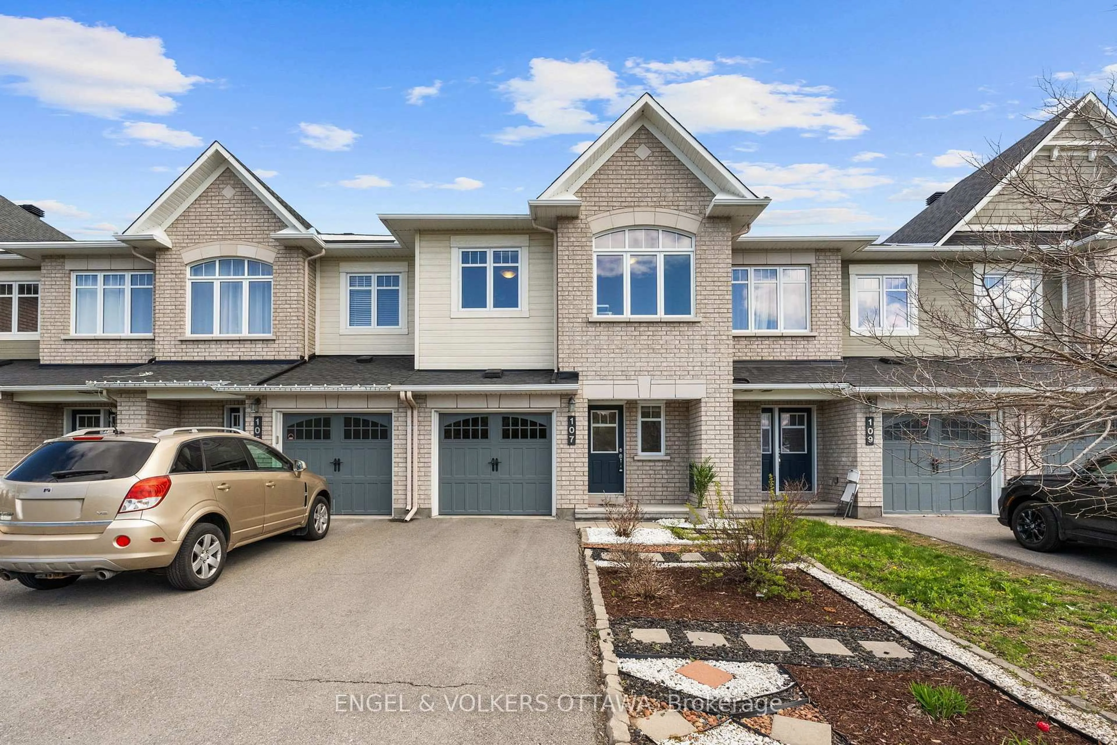 A pic from outside/outdoor area/front of a property/back of a property/a pic from drone, street for 107 Mancini Way, Ottawa Ontario K2J 5X3