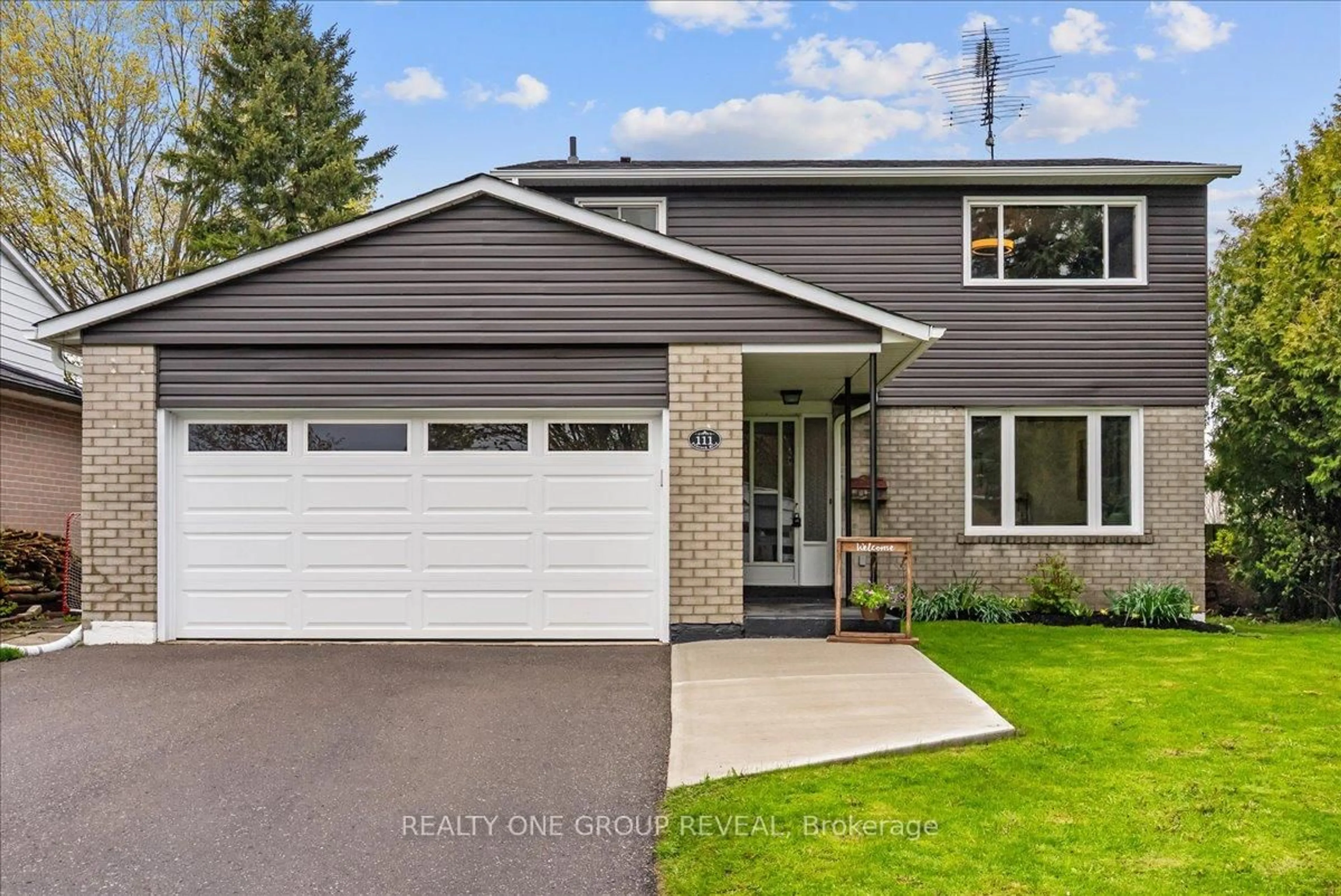 Home with vinyl exterior material, street for 111 Peacock Blvd, Port Hope Ontario L1A 2X5
