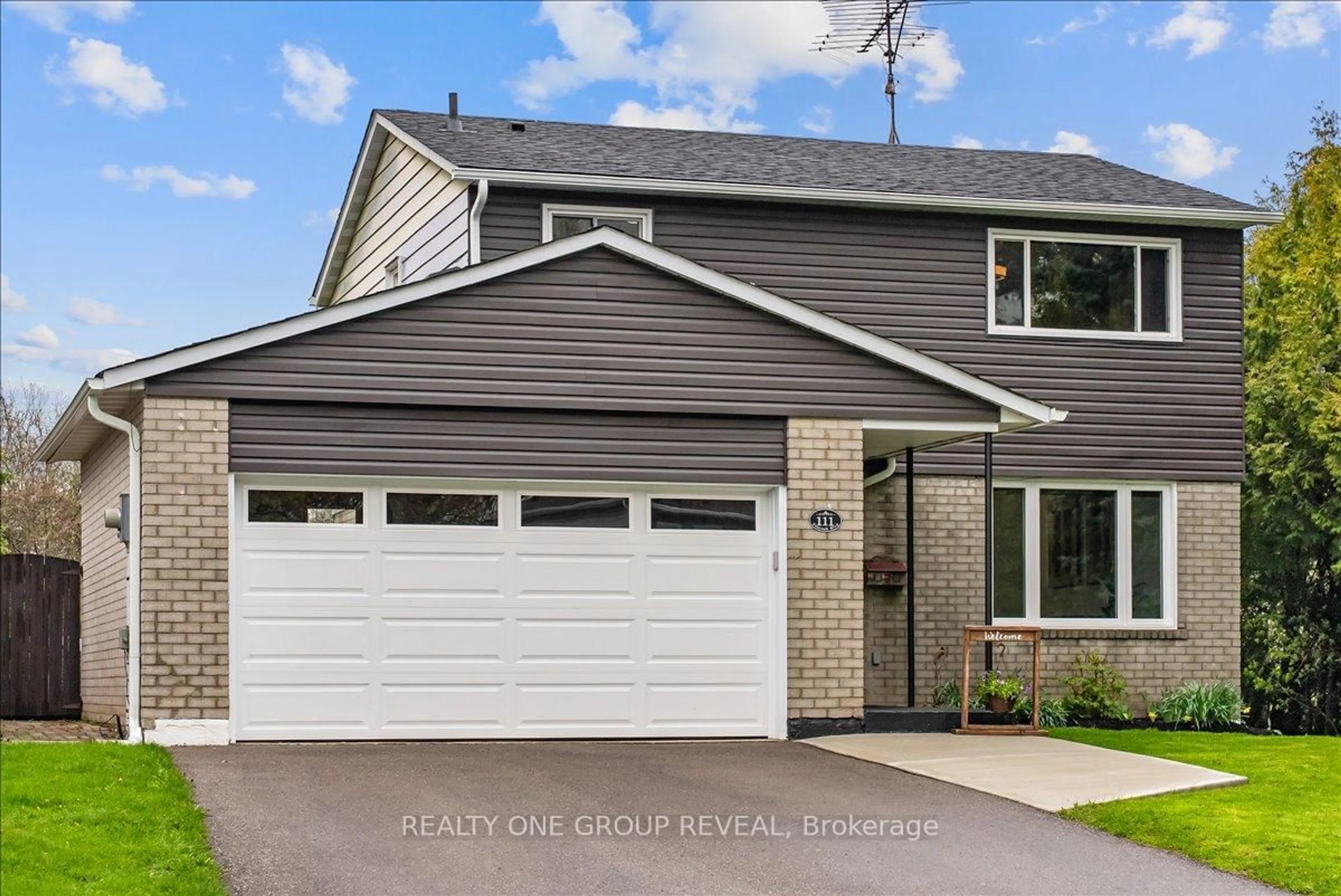 Home with vinyl exterior material, street for 111 Peacock Blvd, Port Hope Ontario L1A 2X5