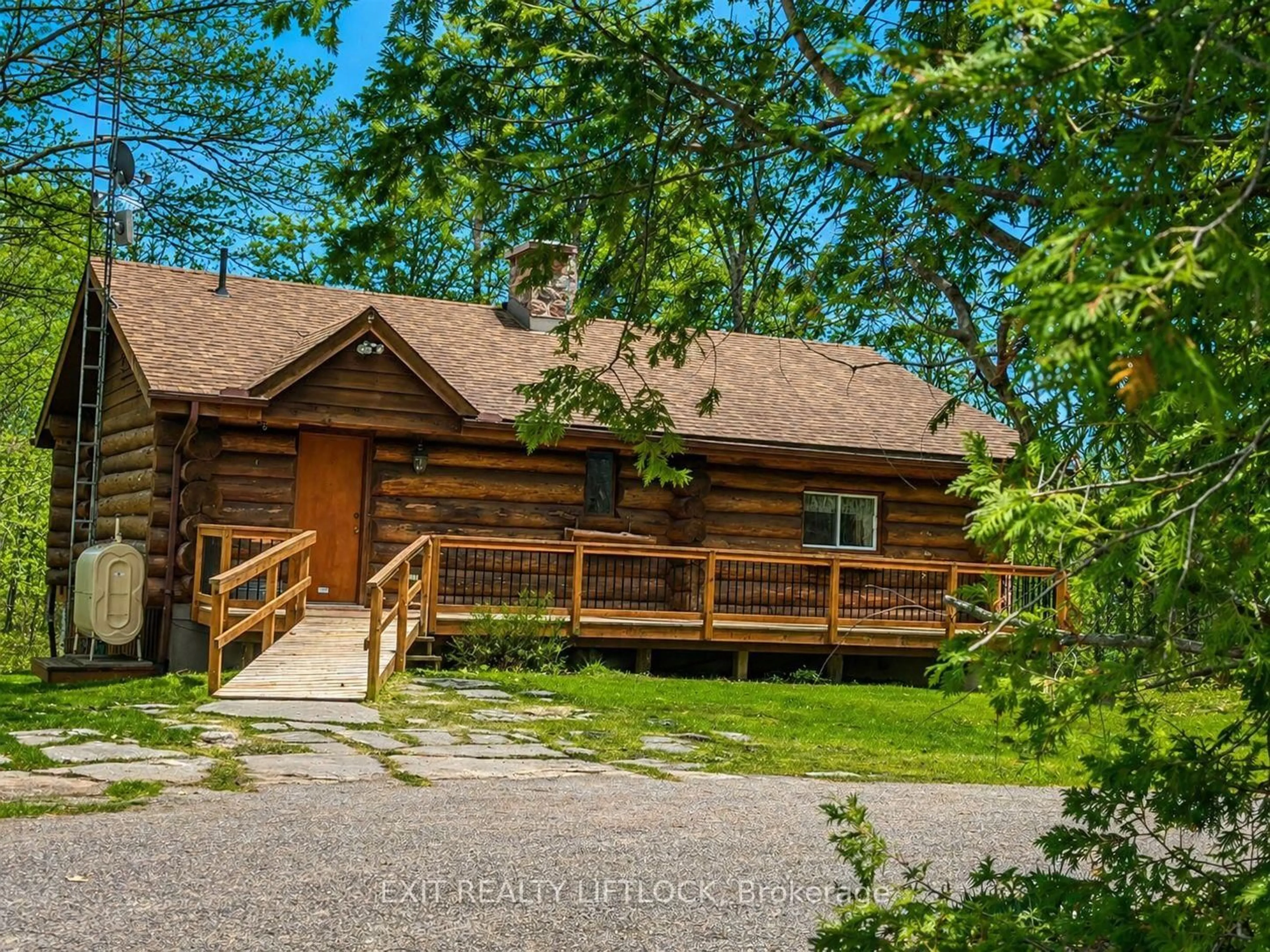 A pic from outside/outdoor area/front of a property/back of a property/a pic from drone, unknown for 720 County Rd 507, Trent Lakes Ontario K0L 1J0