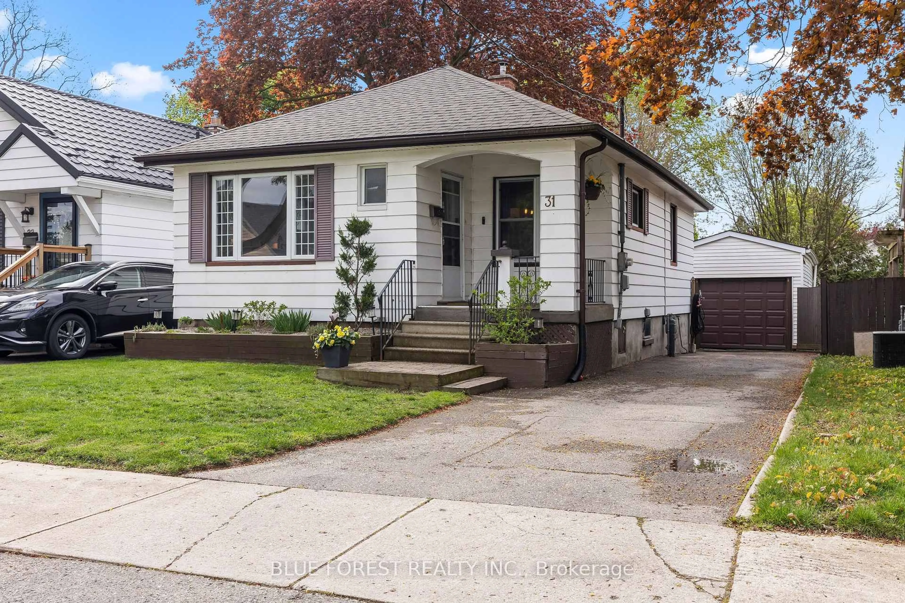Home with vinyl exterior material, street for 31 Eastman Ave, London East Ontario N5W 2M3