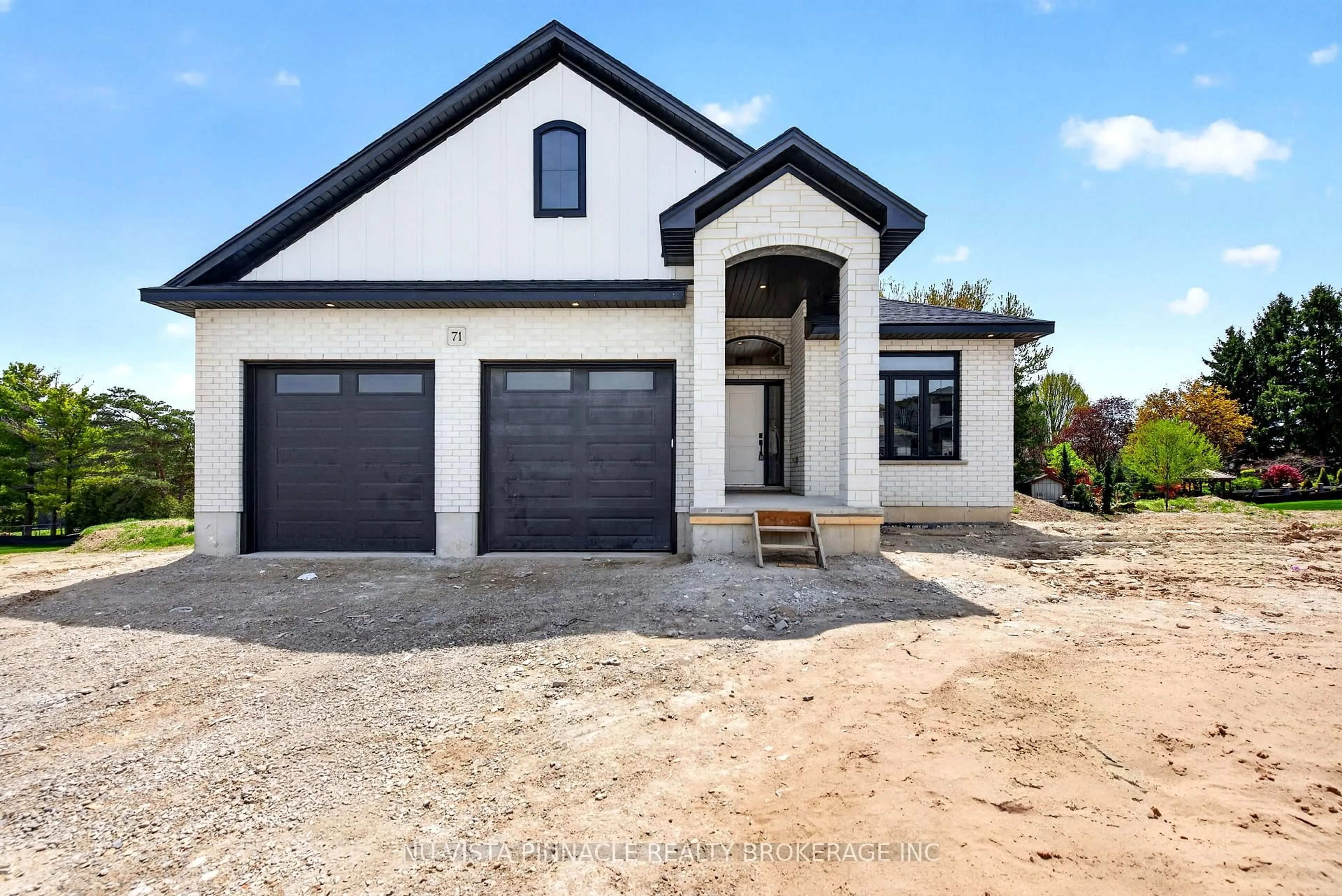 Home with brick exterior material, street for 71 Basil Cres, Middlesex Centre Ontario N0M 2A0