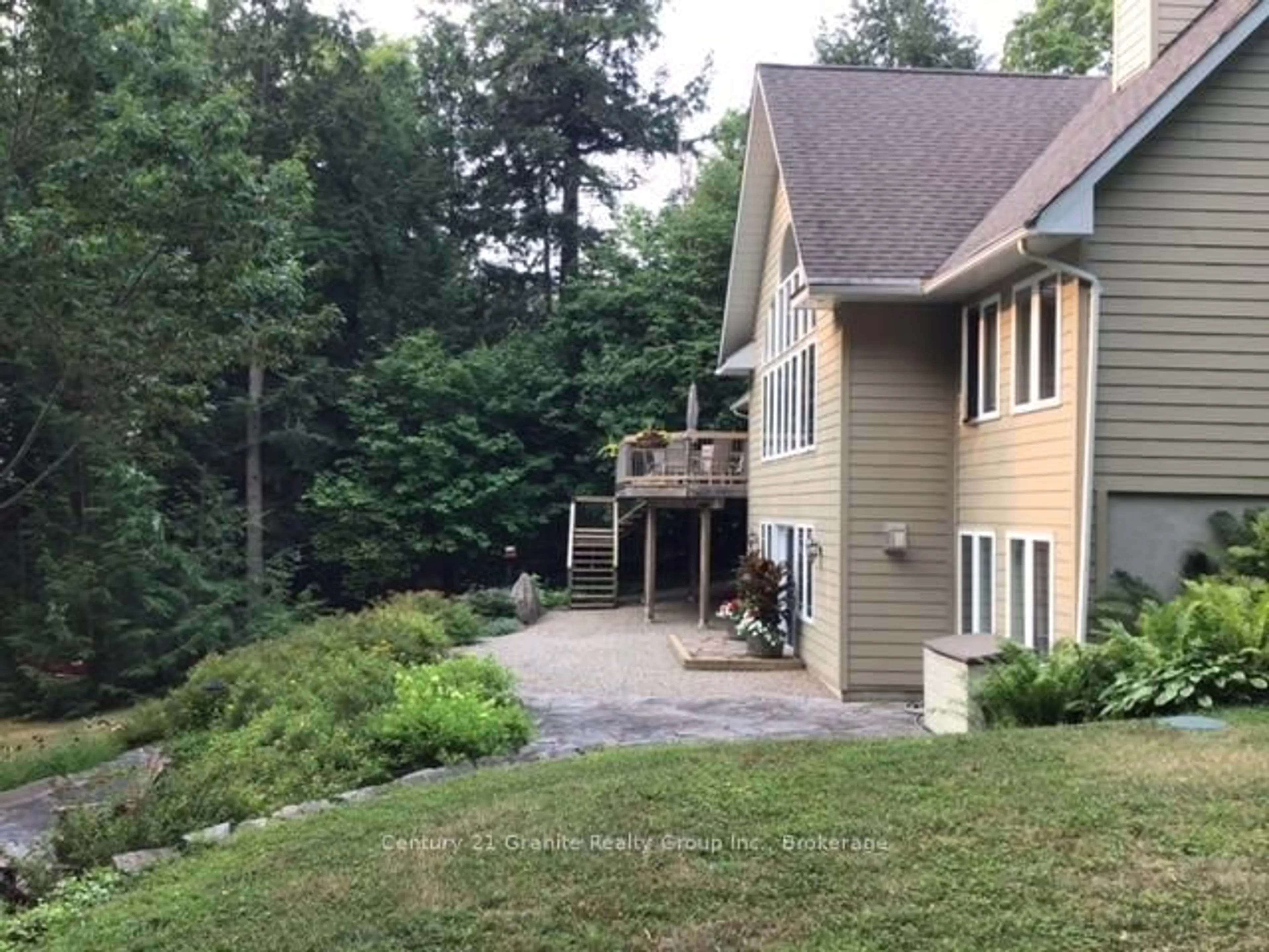 A pic from outside/outdoor area/front of a property/back of a property/a pic from drone, mountain view for 3012 West Shore Rd, Dysart et al Ontario K0M 1S0