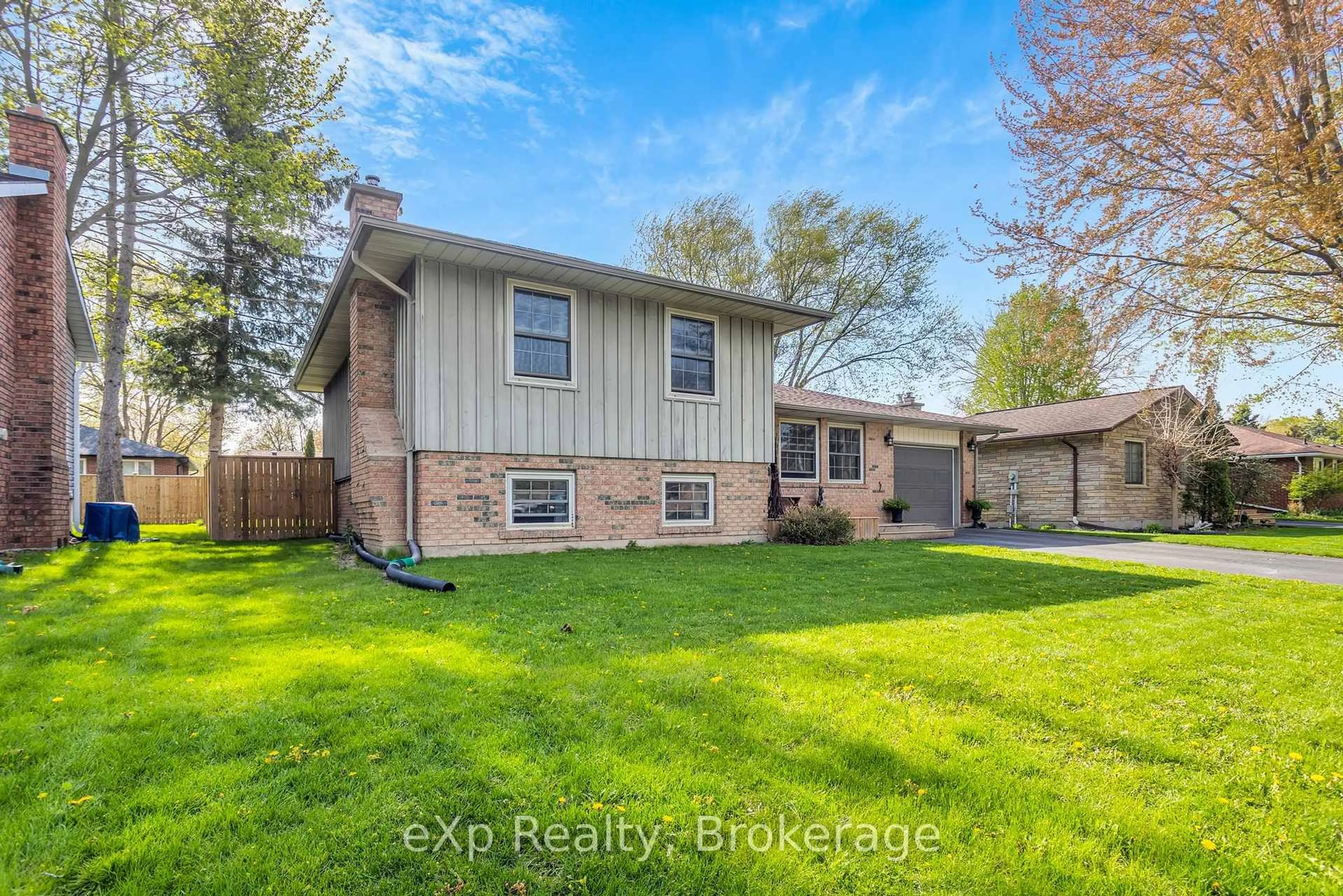 Home with vinyl exterior material, street for 84 Trottier Dr, Tillsonburg Ontario N4G 4R2