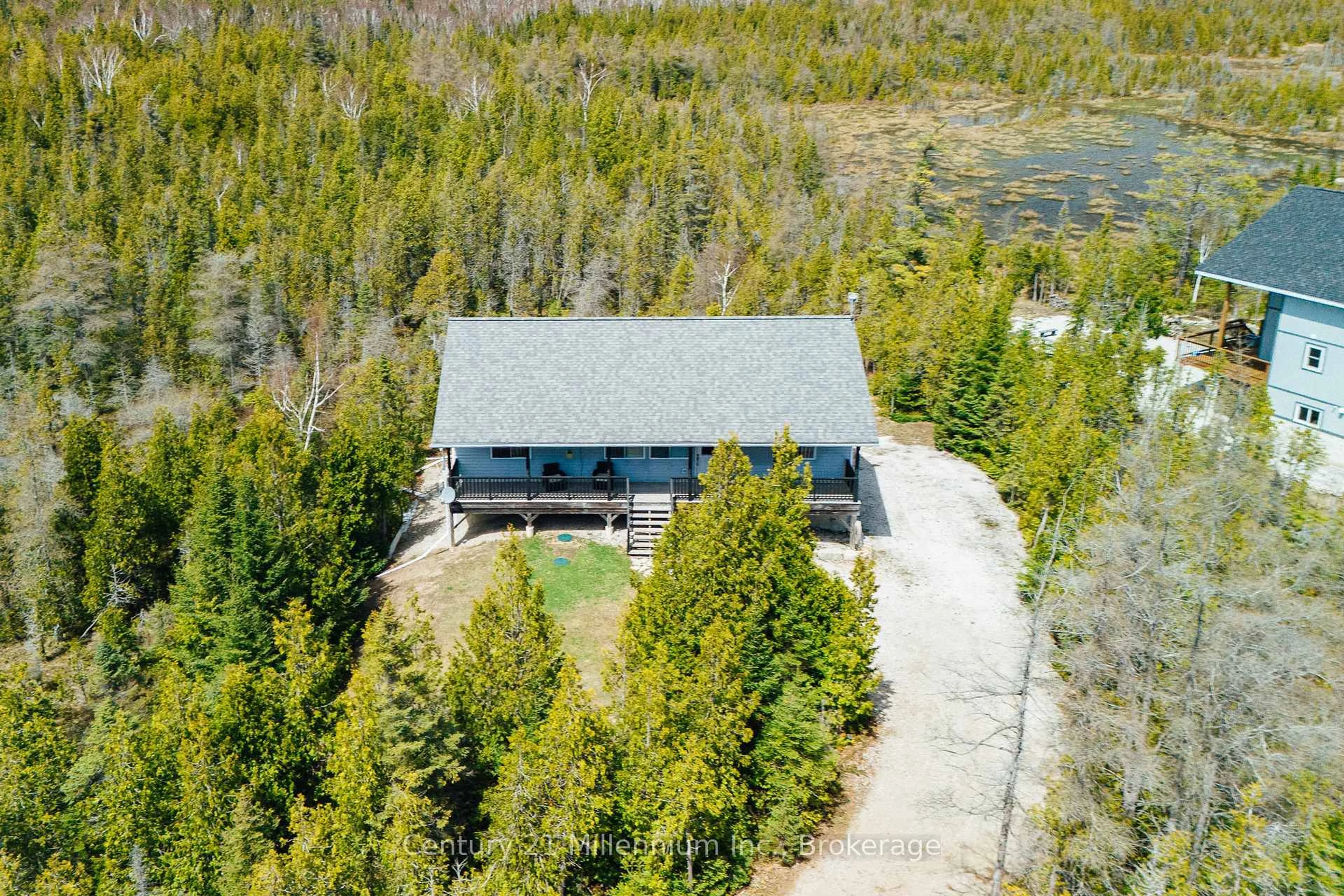 A pic from outside/outdoor area/front of a property/back of a property/a pic from drone, forest/trees view for 62 McIvor Dr, Northern Bruce Peninsula Ontario N0H 1Z0