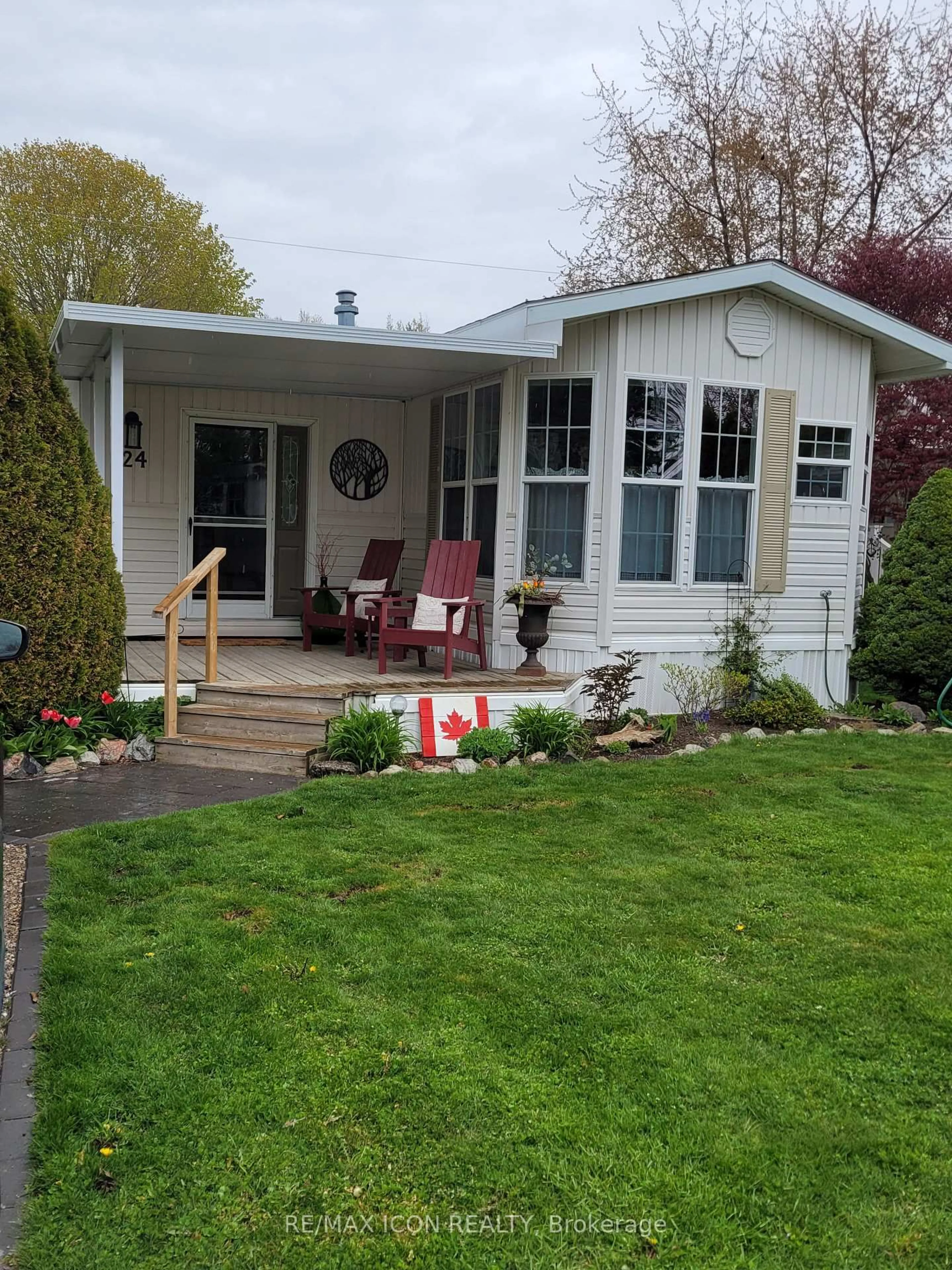 Home with vinyl exterior material, street for 77307 Bluewater Highway #24 Rowan Rd, Bluewater Ontario N0M 1G0