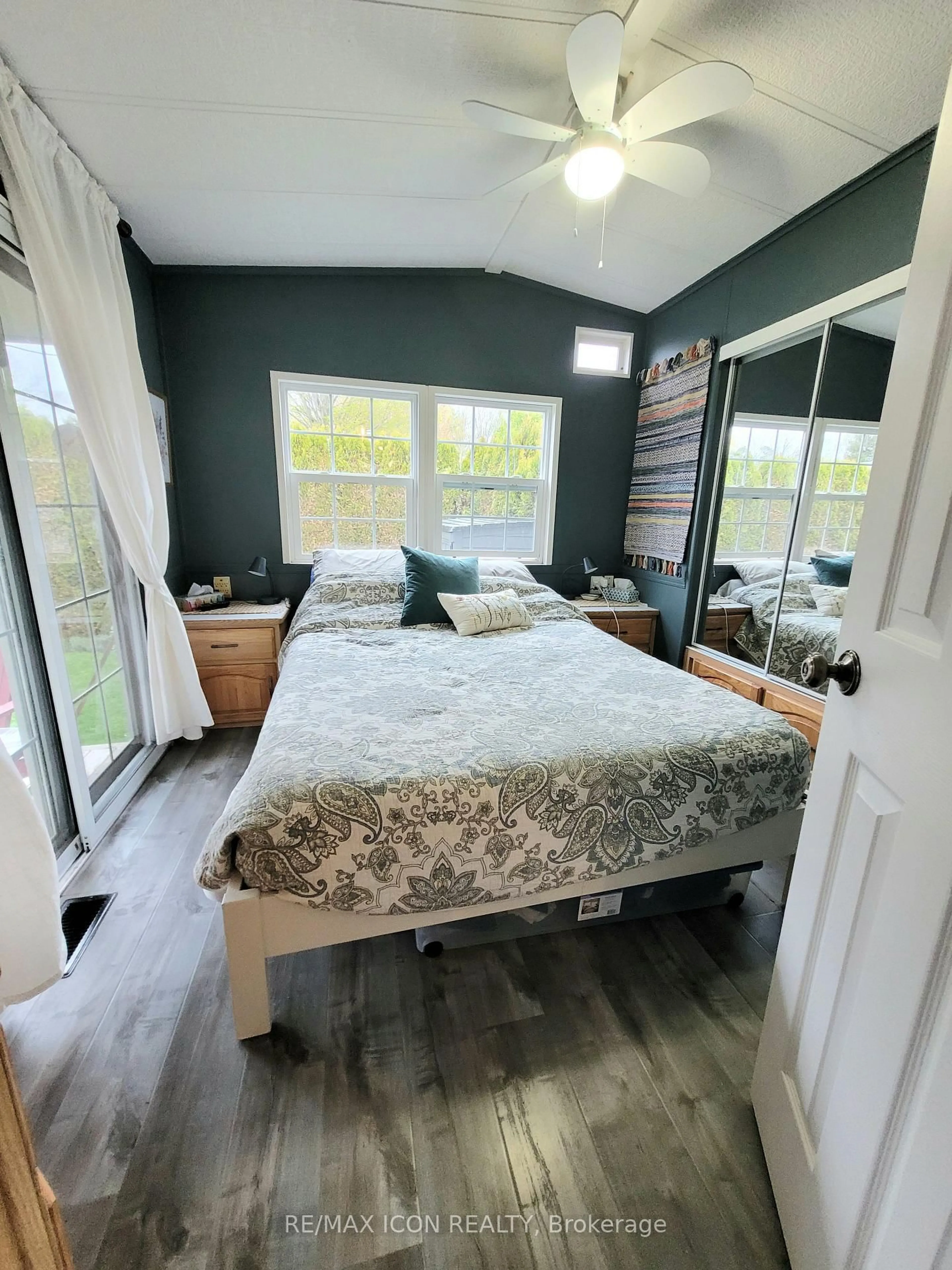 Bedroom with bed, wood/laminate floor for 77307 Bluewater Highway #24 Rowan Rd, Bluewater Ontario N0M 1G0