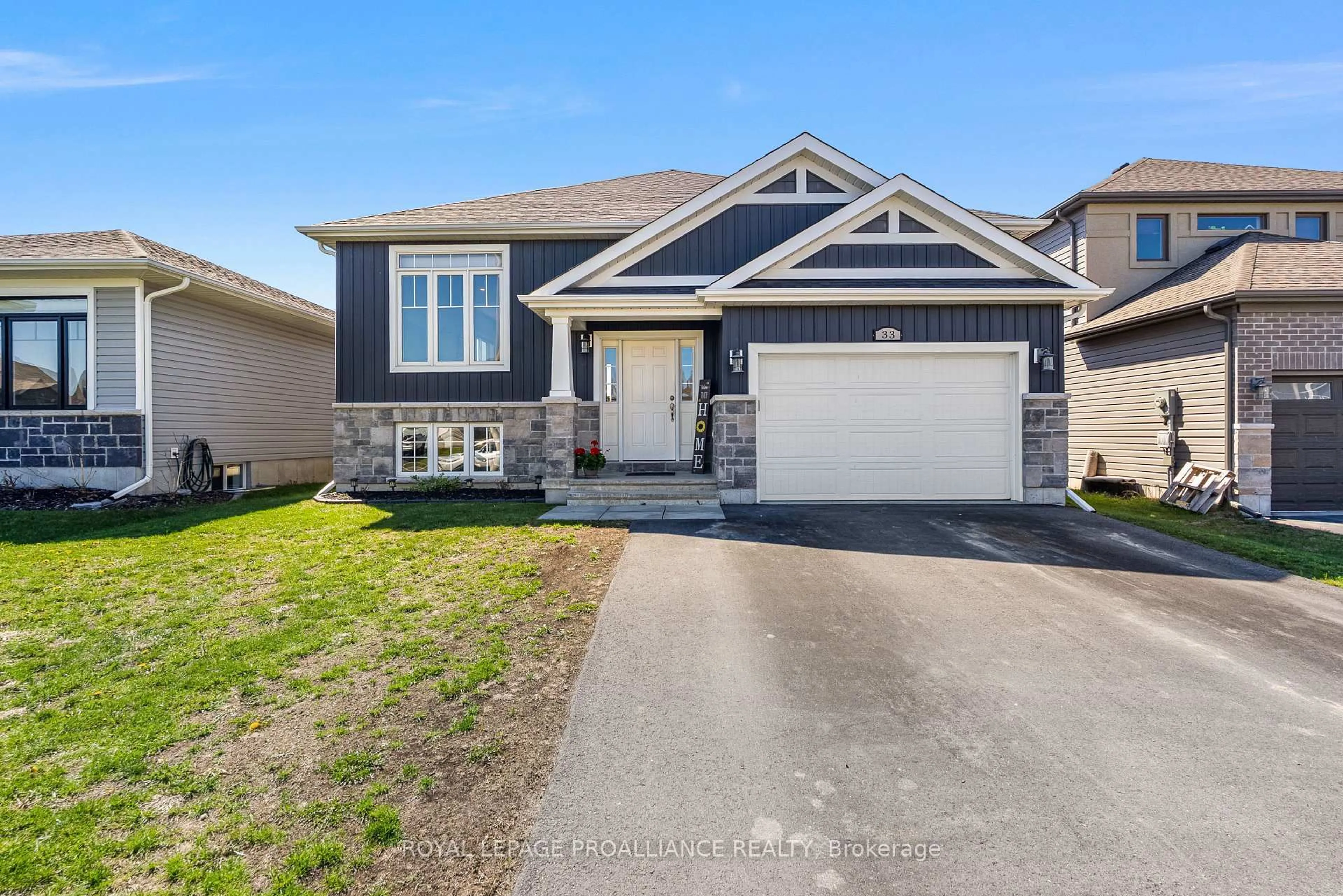 Home with vinyl exterior material, street for 33 Redwood Dr, Belleville Ontario K8N 0K3