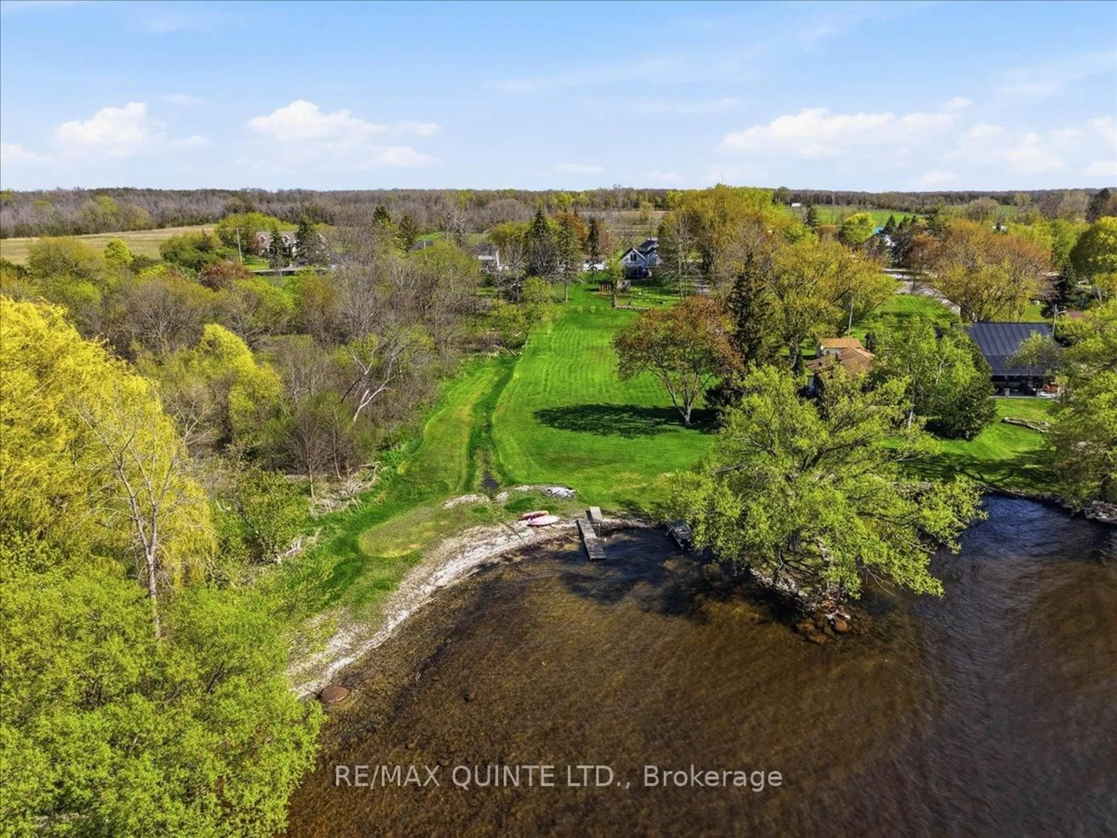 A pic from outside/outdoor area/front of a property/back of a property/a pic from drone, water/lake/river/ocean view for 1467 County Rd 15 Rd, Prince Edward County Ontario K0K 1W0